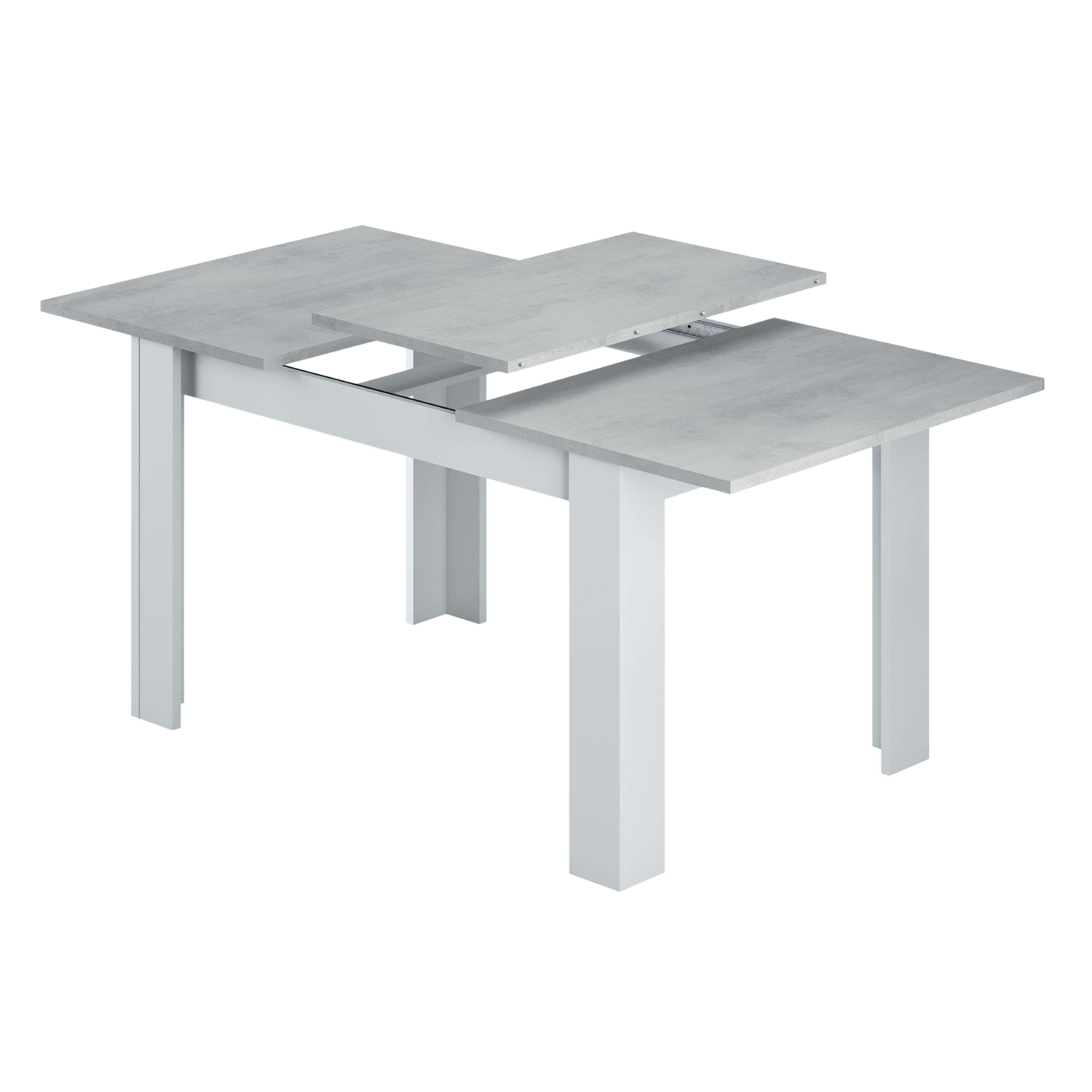 Una mesa extensible con tapa efecto hormigón y patas blancas.