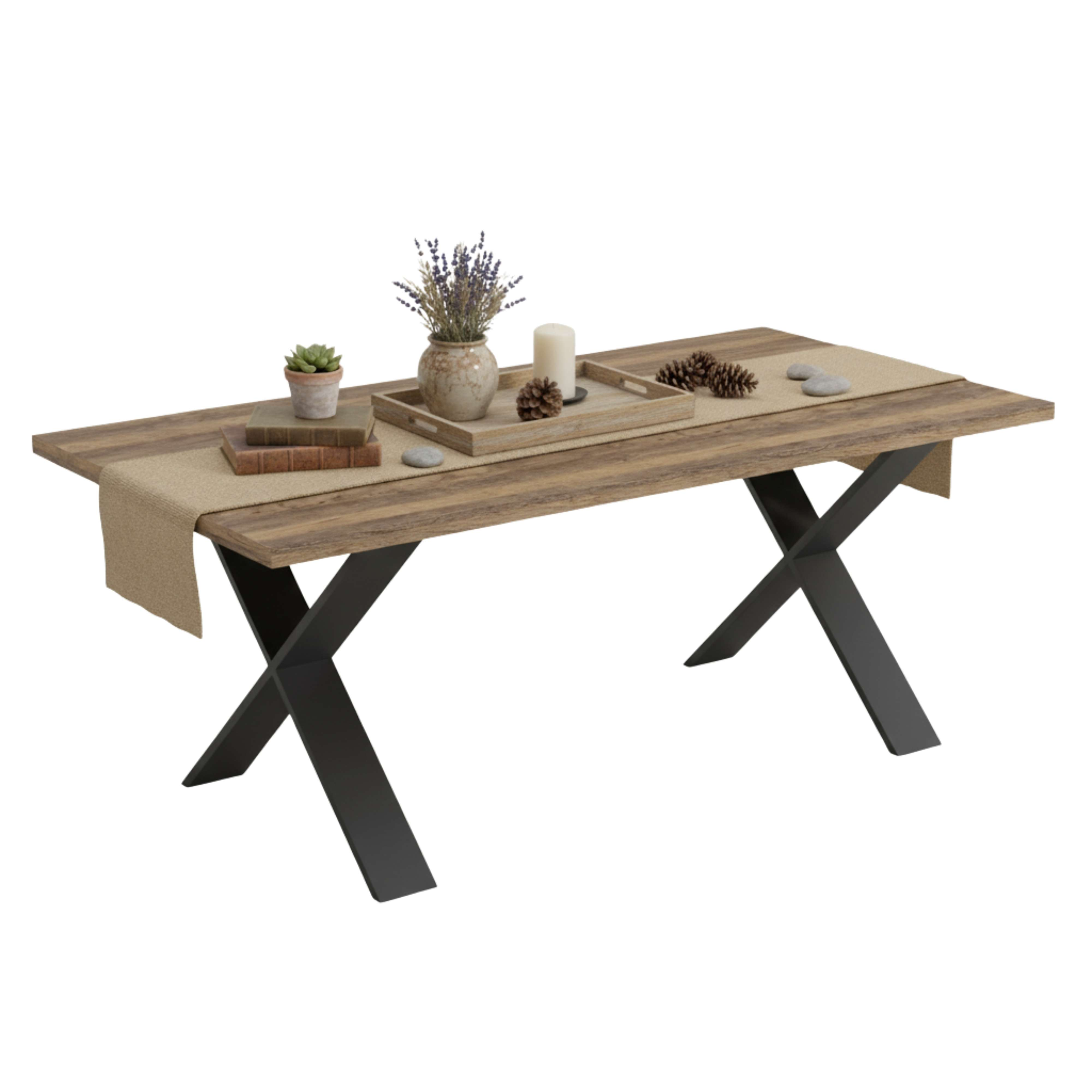 Mesa de madera con patas en X negras, decorada con camino de mesa de lino, libros, lavanda y piñas.