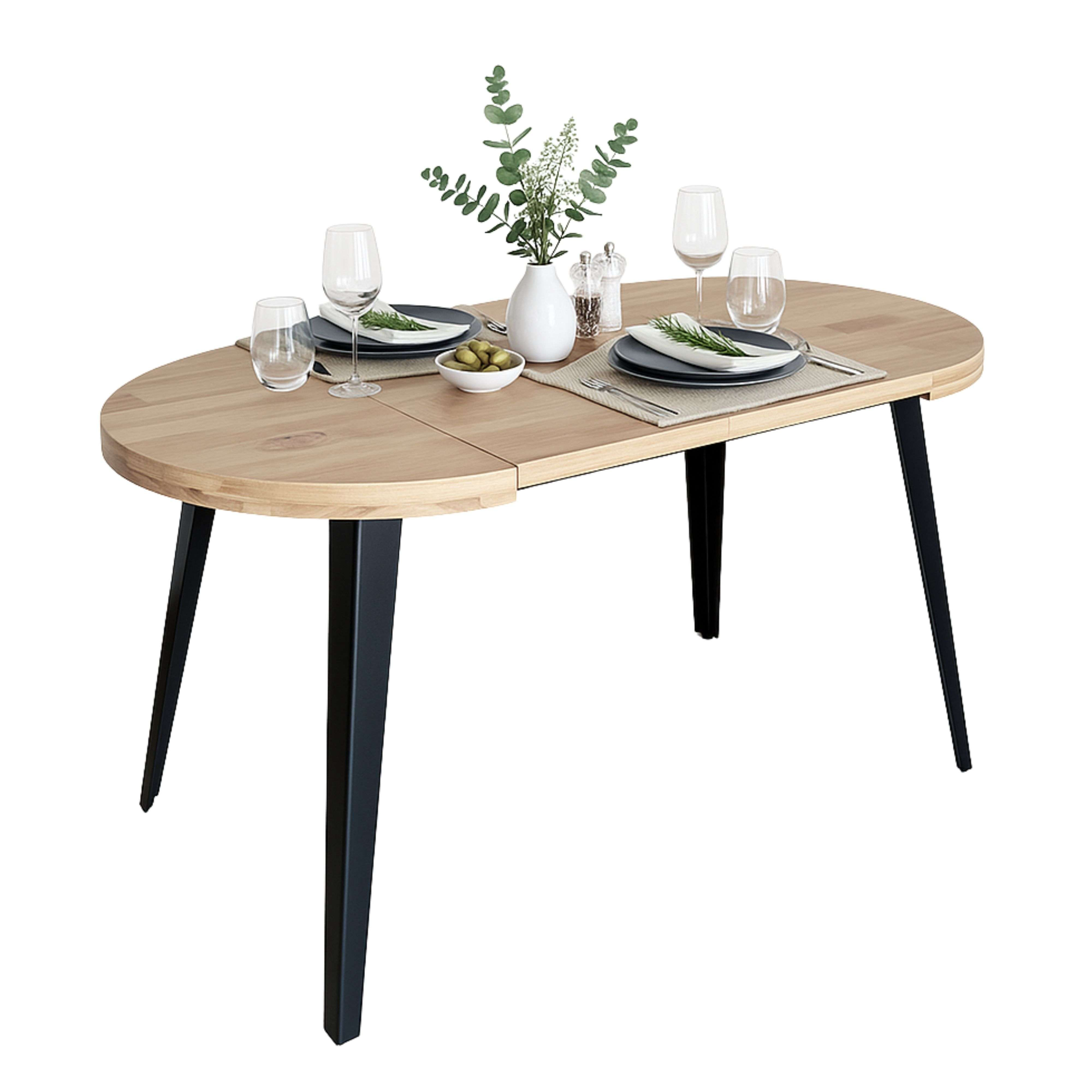 Una mesa ovalada de madera con patas negras, puesta para dos personas.