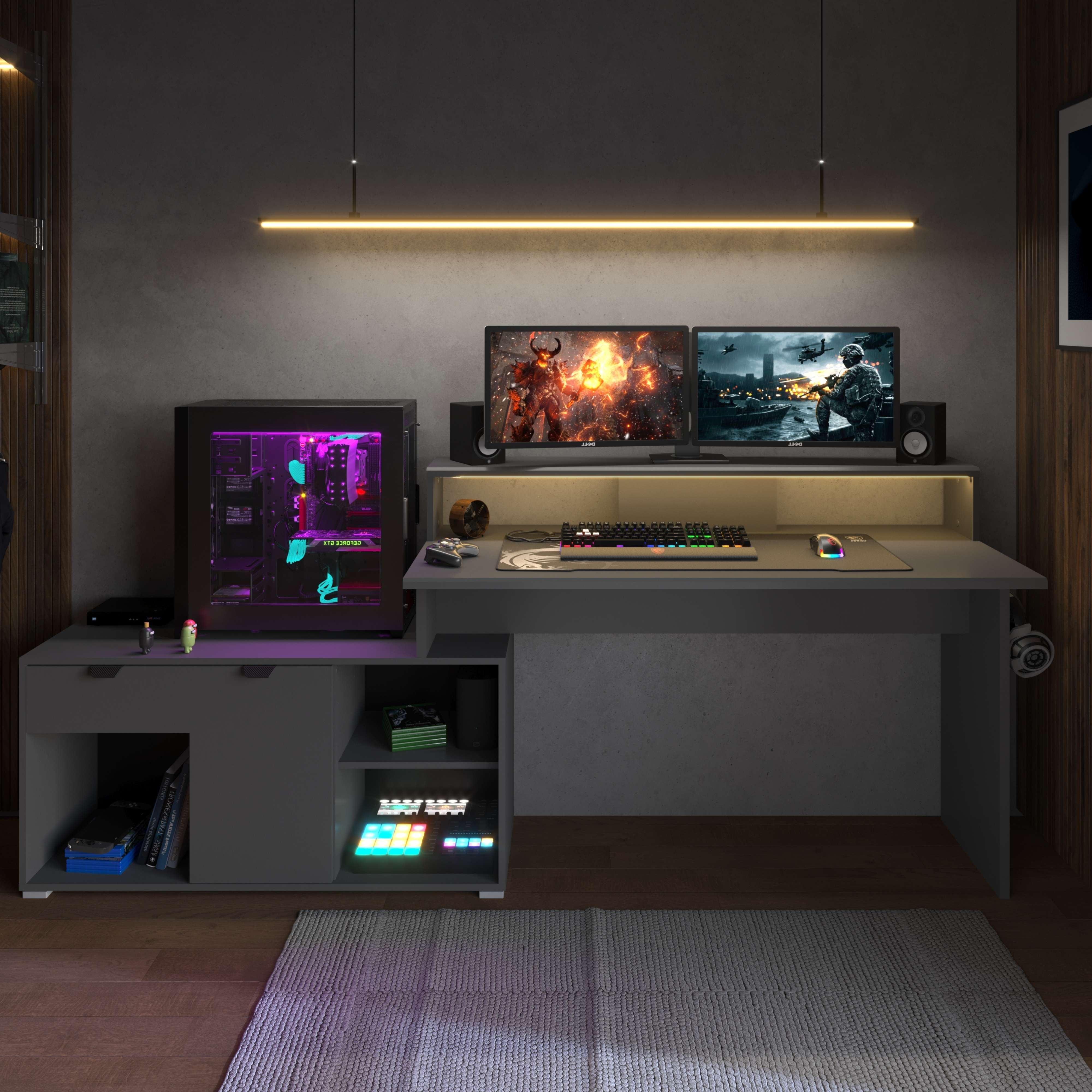 Una configuración de juego con PC, dos monitores, teclado, ratón y escritorio.