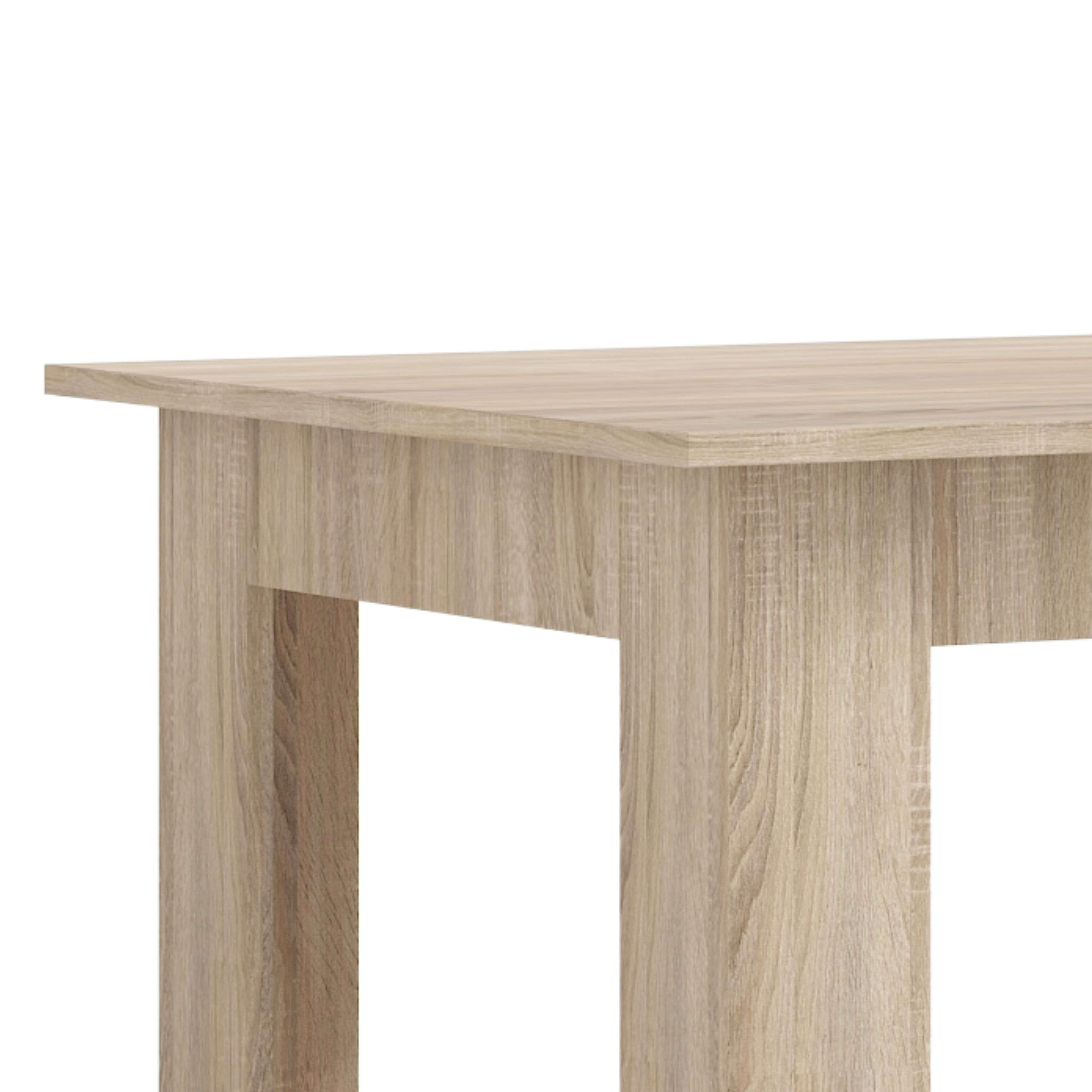 Un primer plano de una superficie de madera marrón claro con veta vertical.