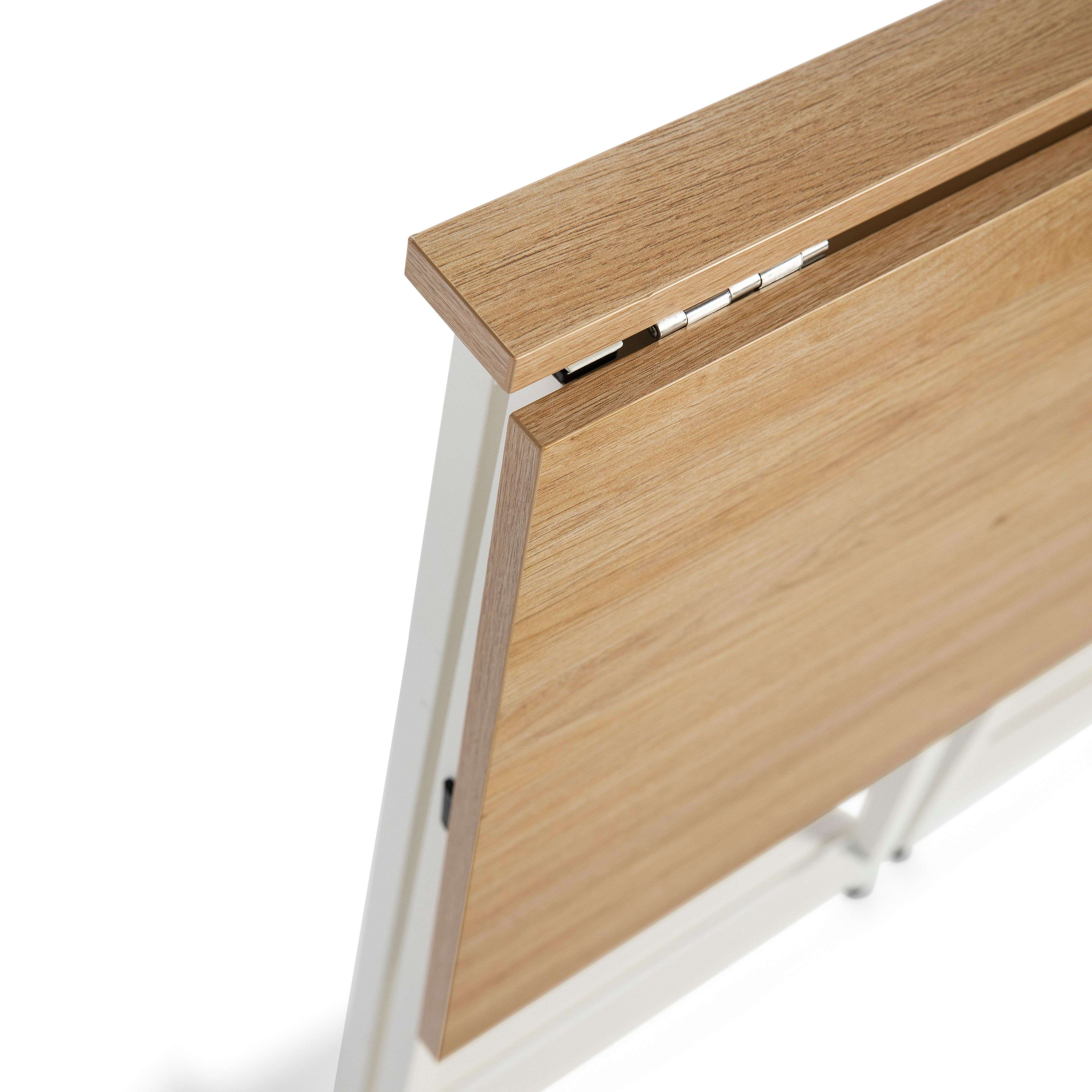 Un tablero de mesa de madera con marco blanco y bisagras.