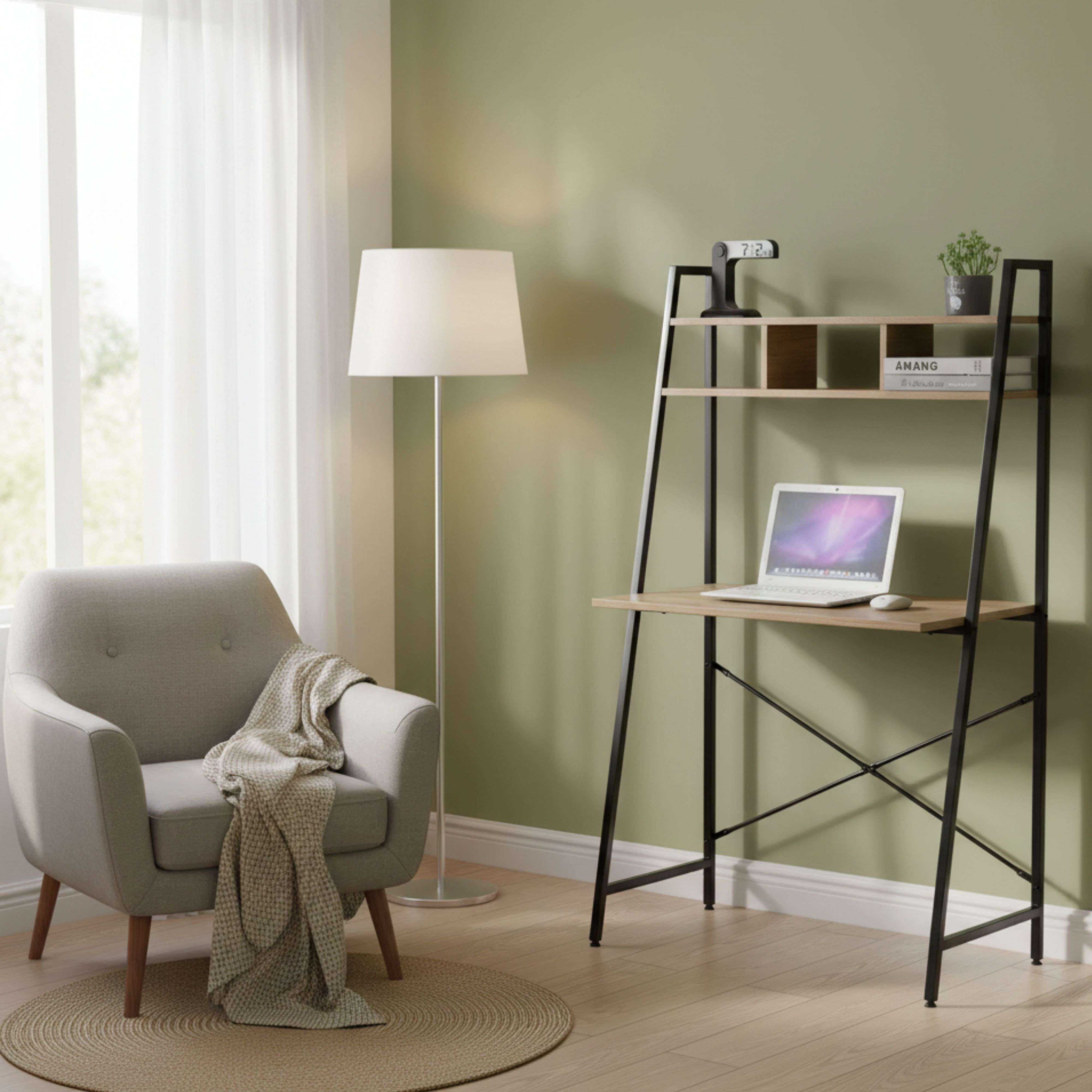 Un sillón con manta, lámpara de pie y escritorio con portátil.
