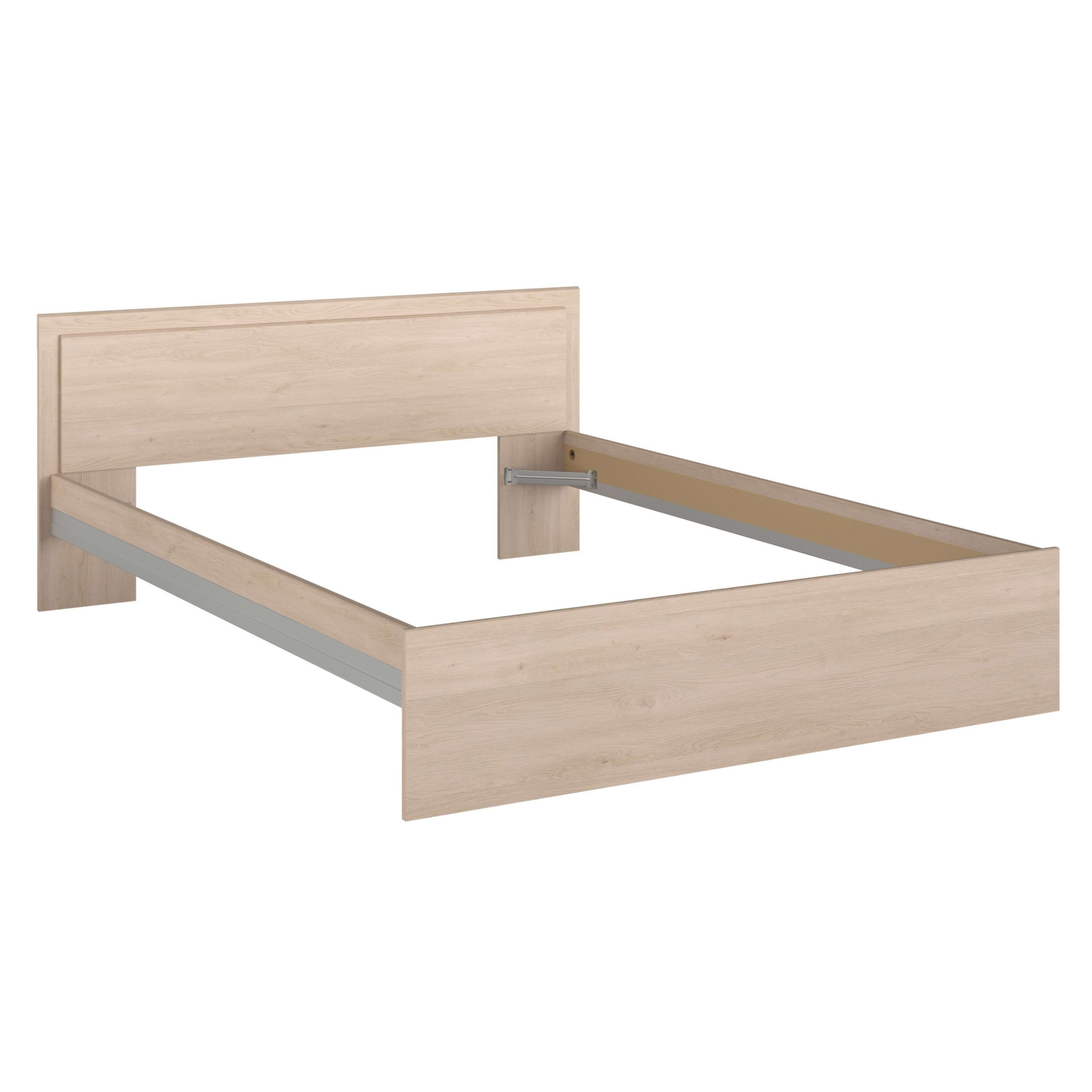 Un somier de madera clara sin colchón, con cabecero.