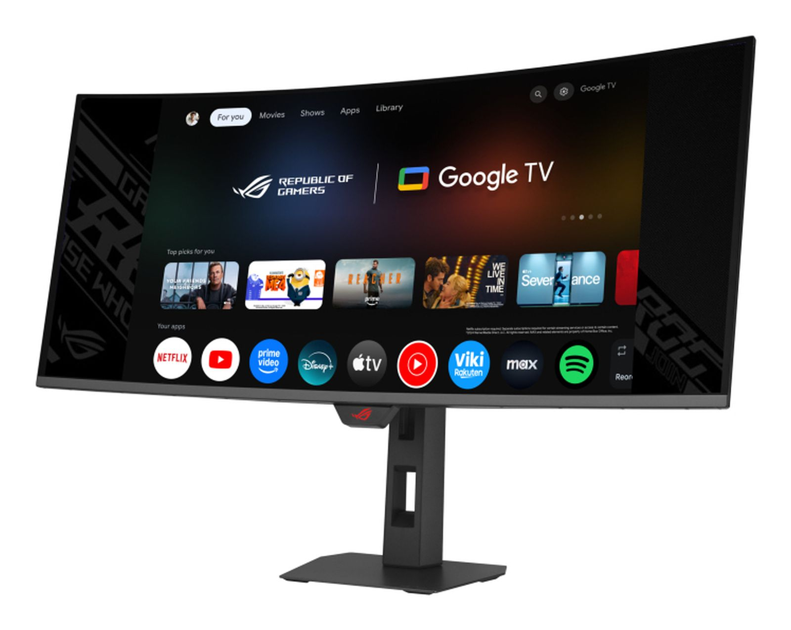 Zakrzywiony monitor z interfejsem Google TV, wyświetlający aplikacje i wybór filmów.