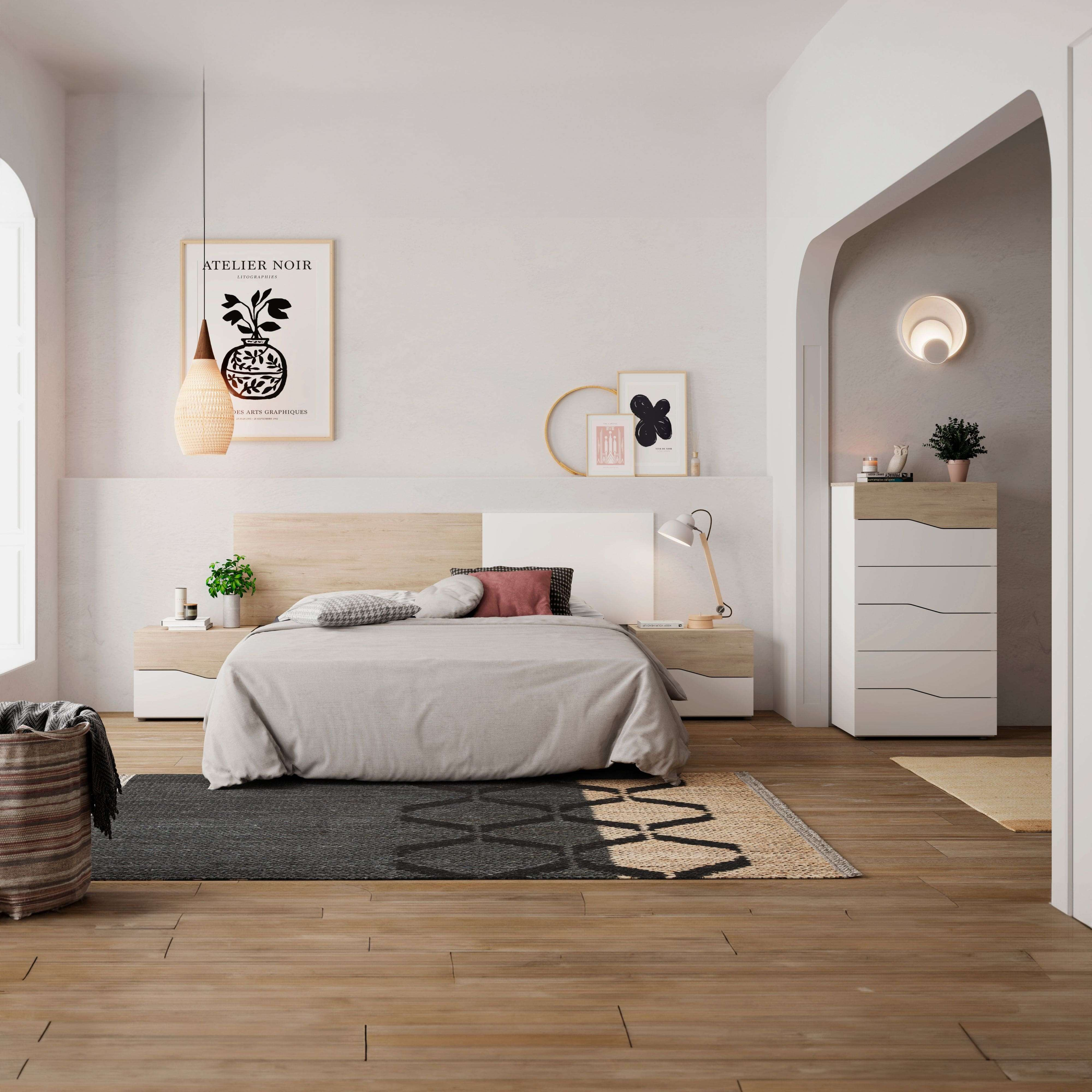 Dormitorio moderno con cama, mesitas de noche, cómoda y arte de pared.