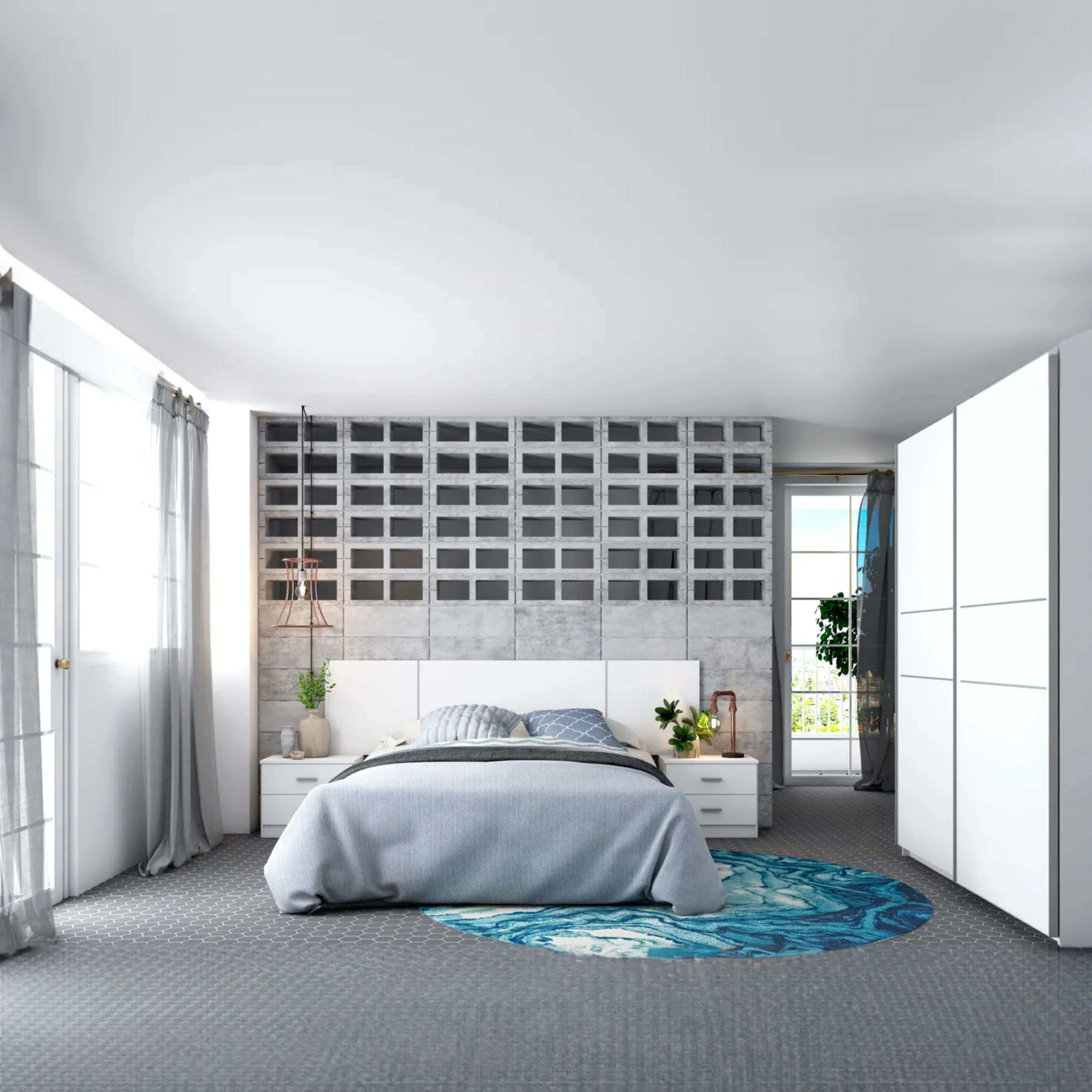Dormitorio moderno con cama blanca, ropa de cama gris y acentos azules.
