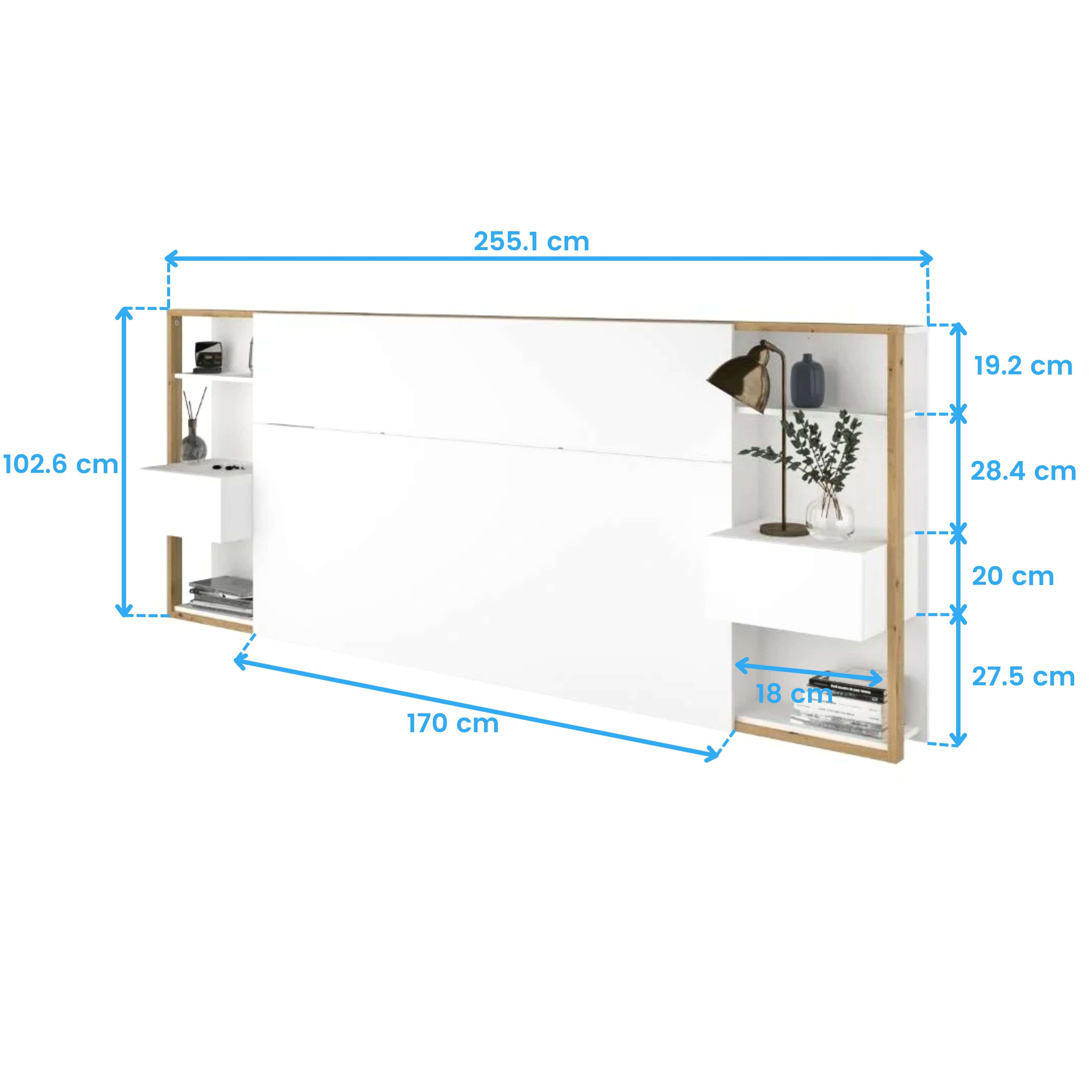 Unidad de cama de pared blanca con estantes, mesita de noche, lámpara, jarrón y libros.