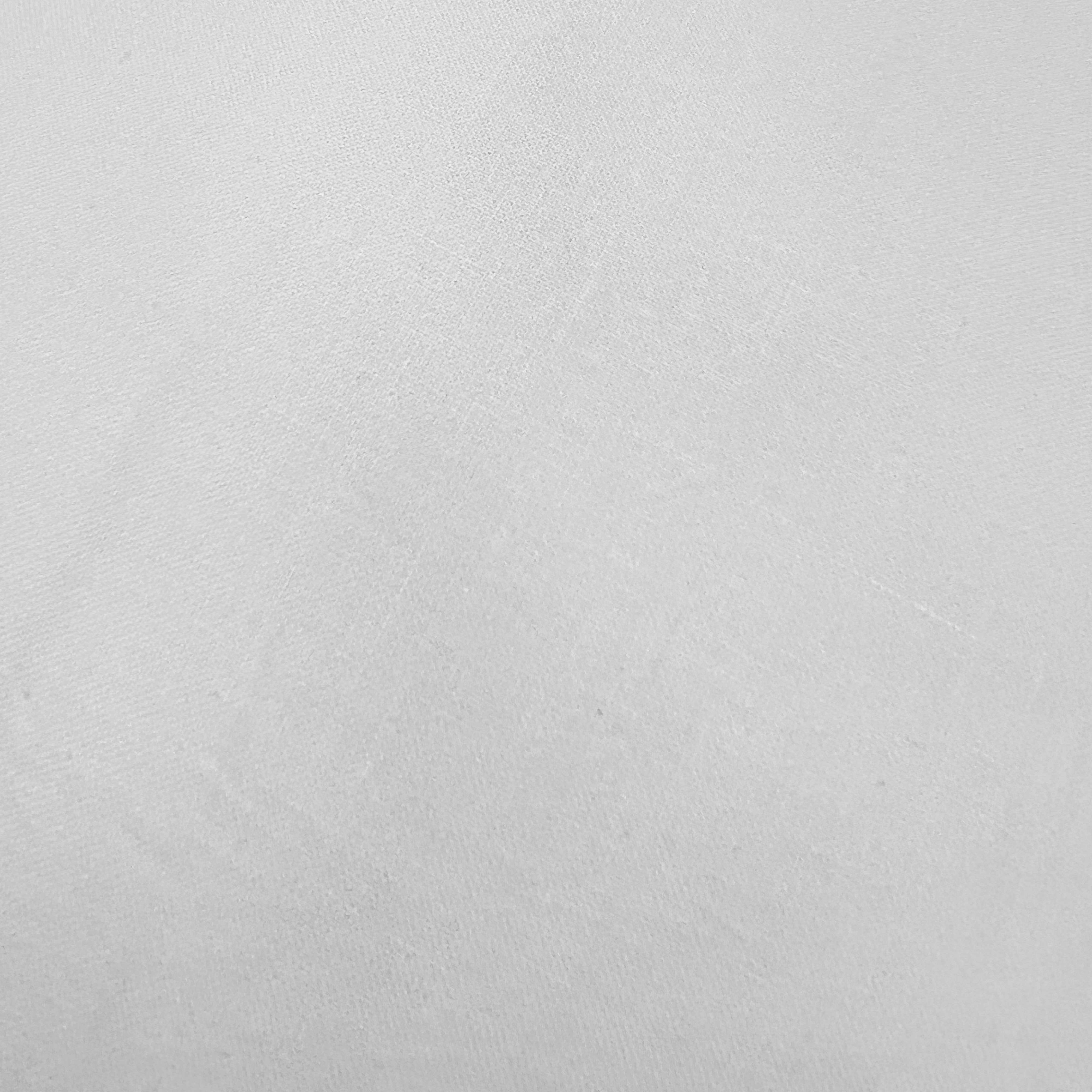 Un primer plano de tela texturizada blanca con patrones de tejido visibles.
