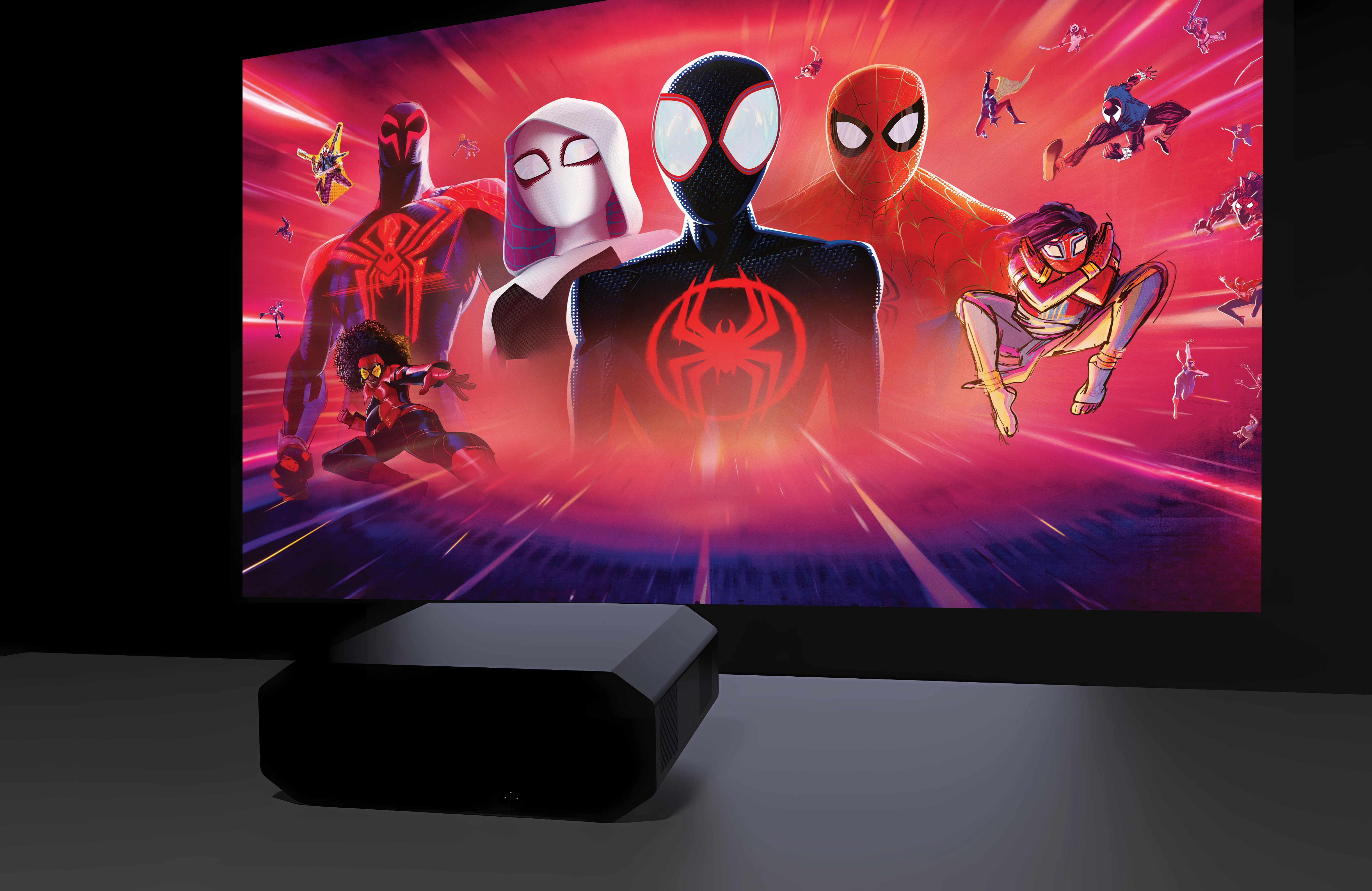 Mehrere Spider-Men und Frauen auf einem leuchtend roten Hintergrund.