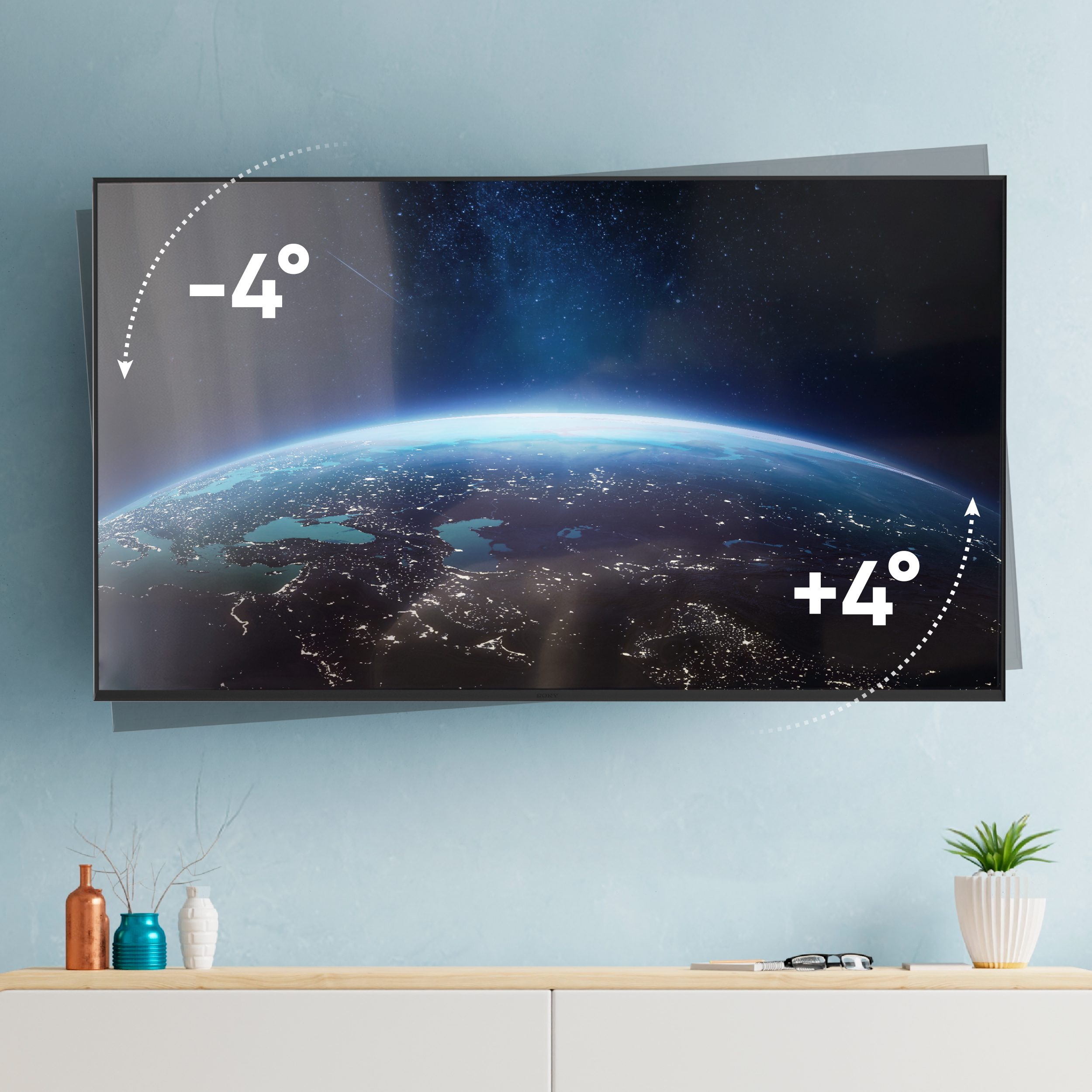 Telewizor wyświetla Ziemię z kosmosu ze wskaźnikami nachylenia -4° i +4°.