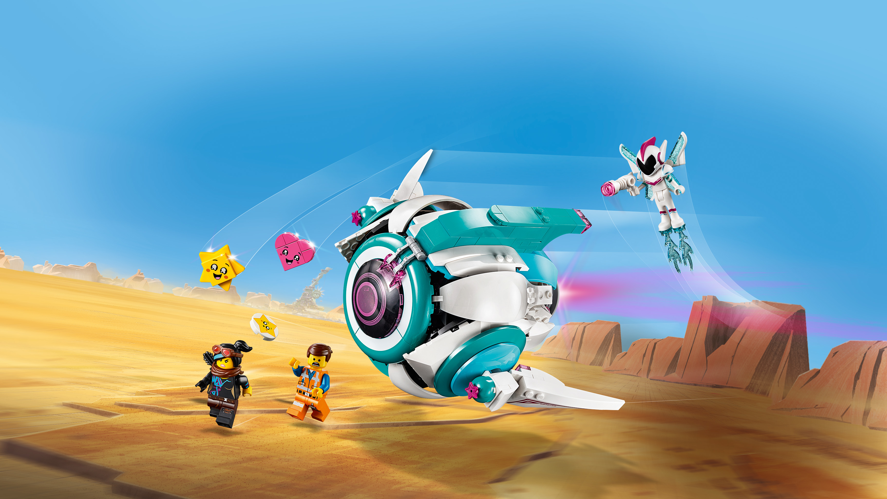 Personaggi Lego con astronave che volano in un paesaggio desertico.
