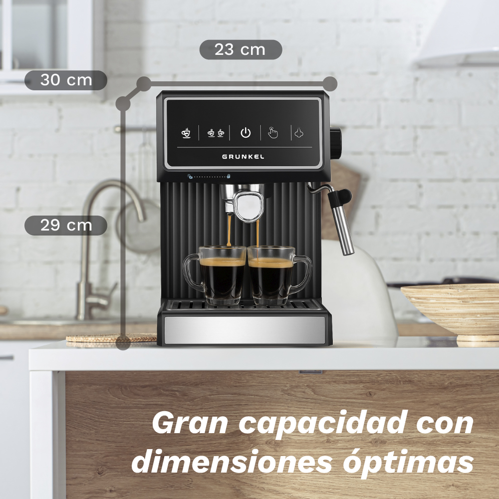 Una cafetera negra con dos tazas de espresso. Se muestran las dimensiones.