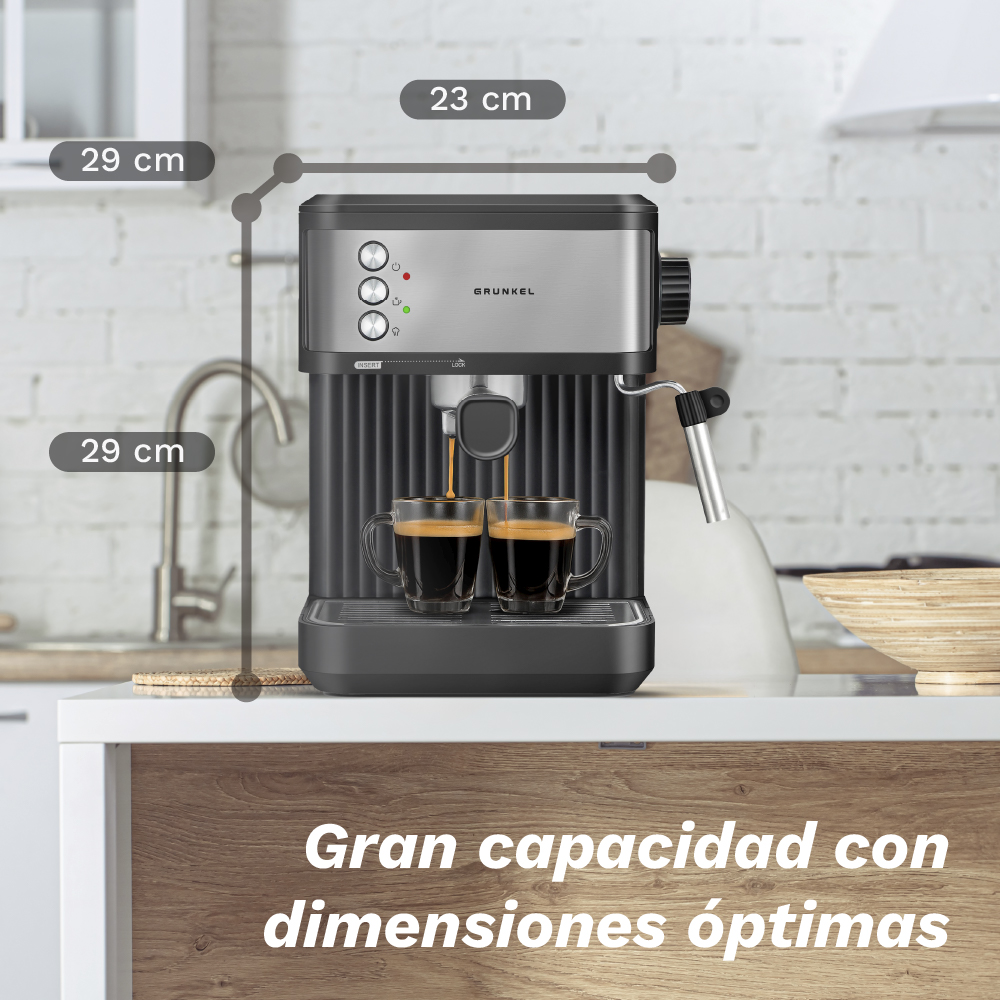 Una máquina de espresso Grunkel prepara dos tazas de café. Dimensiones: 29cm, 23cm.