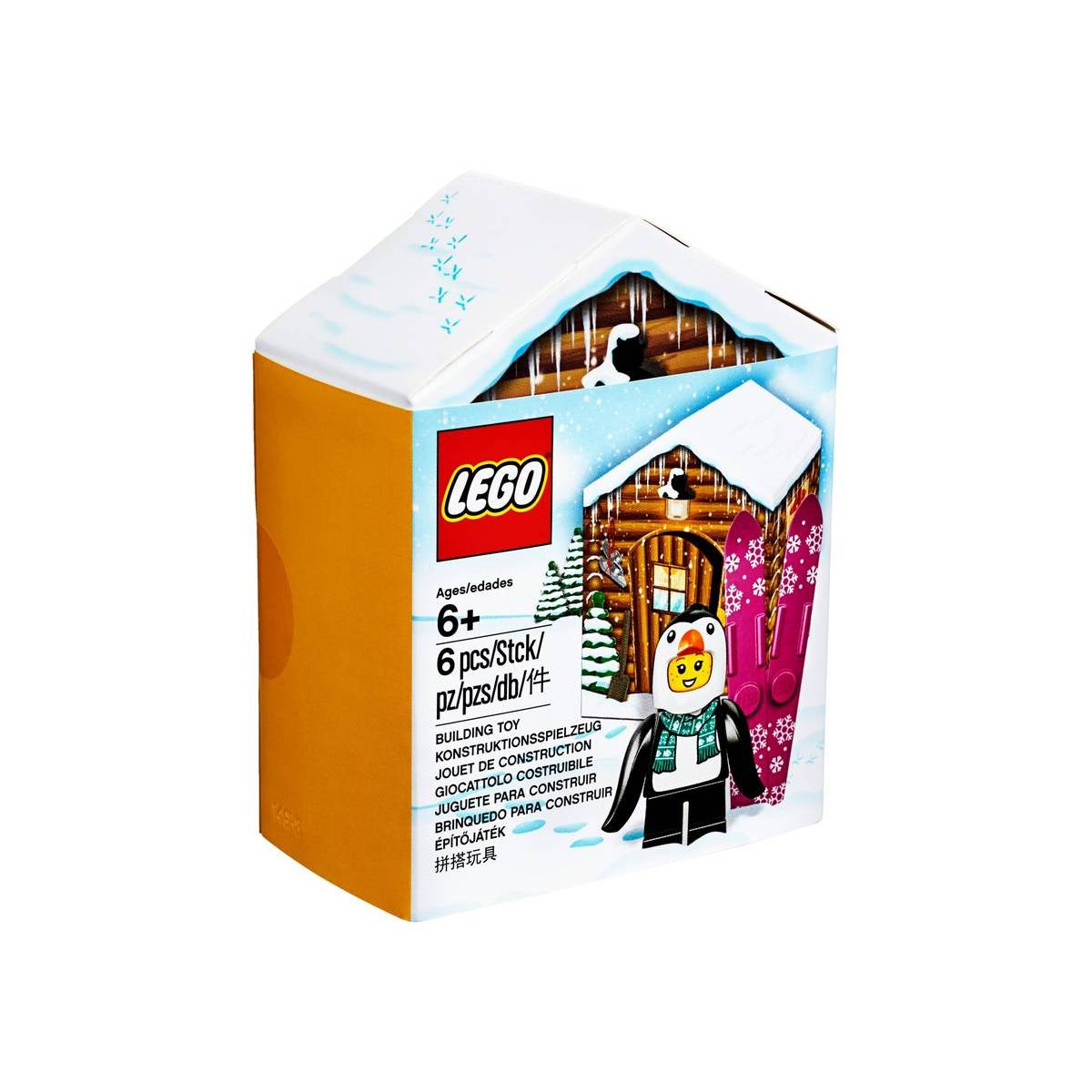 Scatola giocattolo LEGO con minifigure di pinguino e baita.