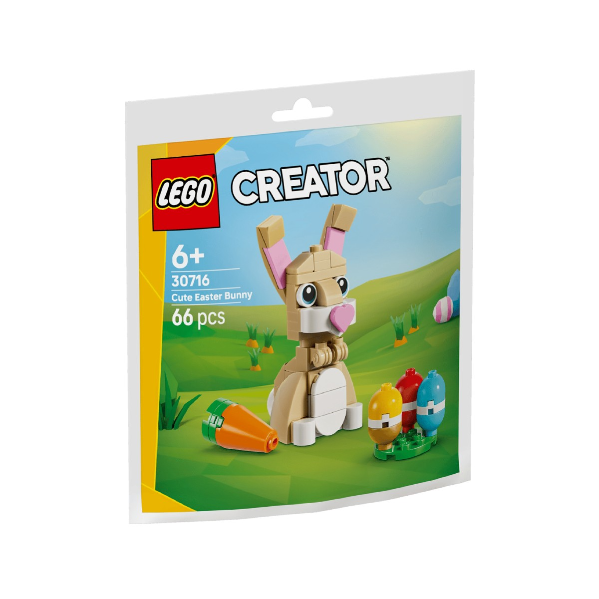 Set LEGO Creator con coniglietto pasquale, carota e uova pasquali su collina.