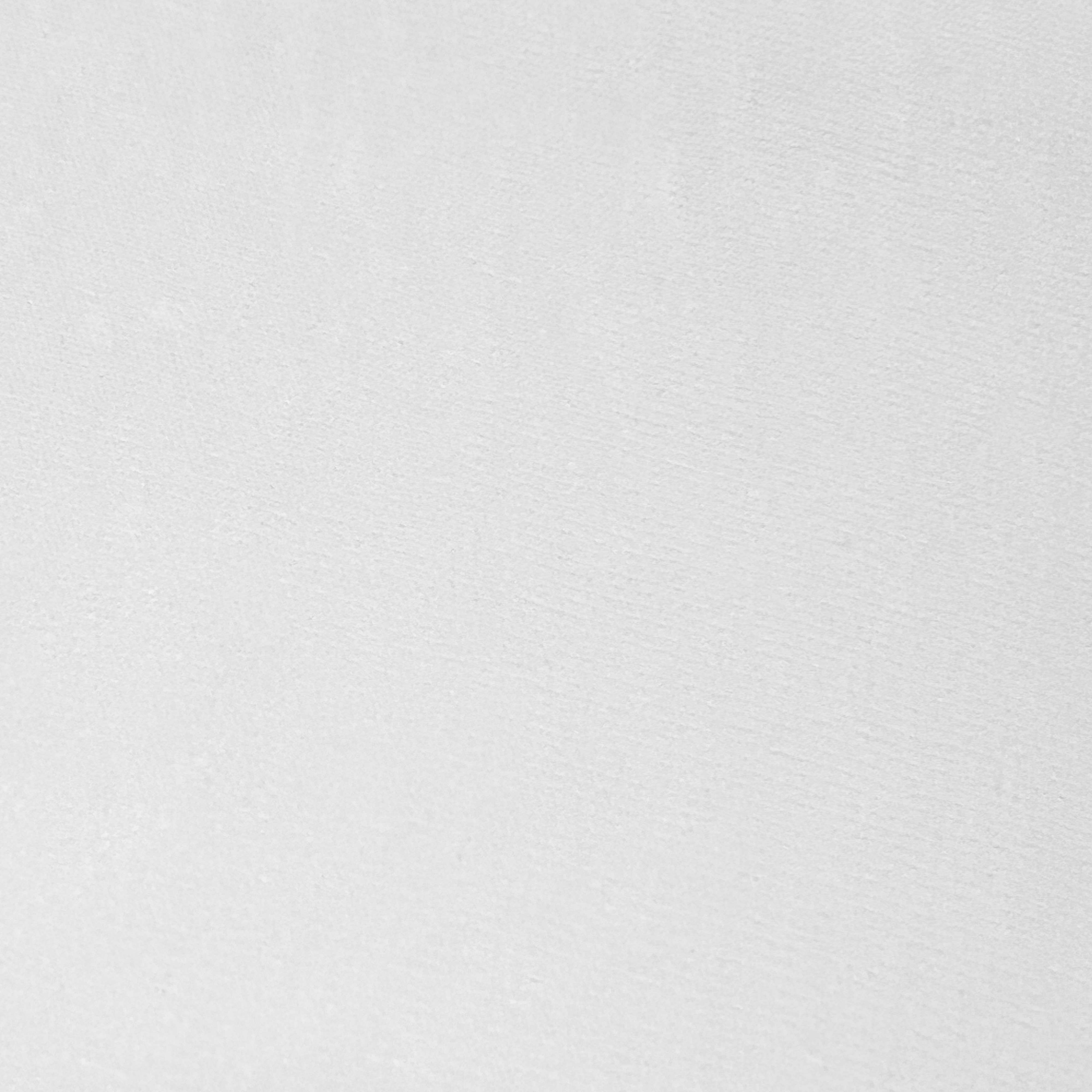 Un fondo blanco liso y texturizado con sutiles sombras y variaciones de tono.