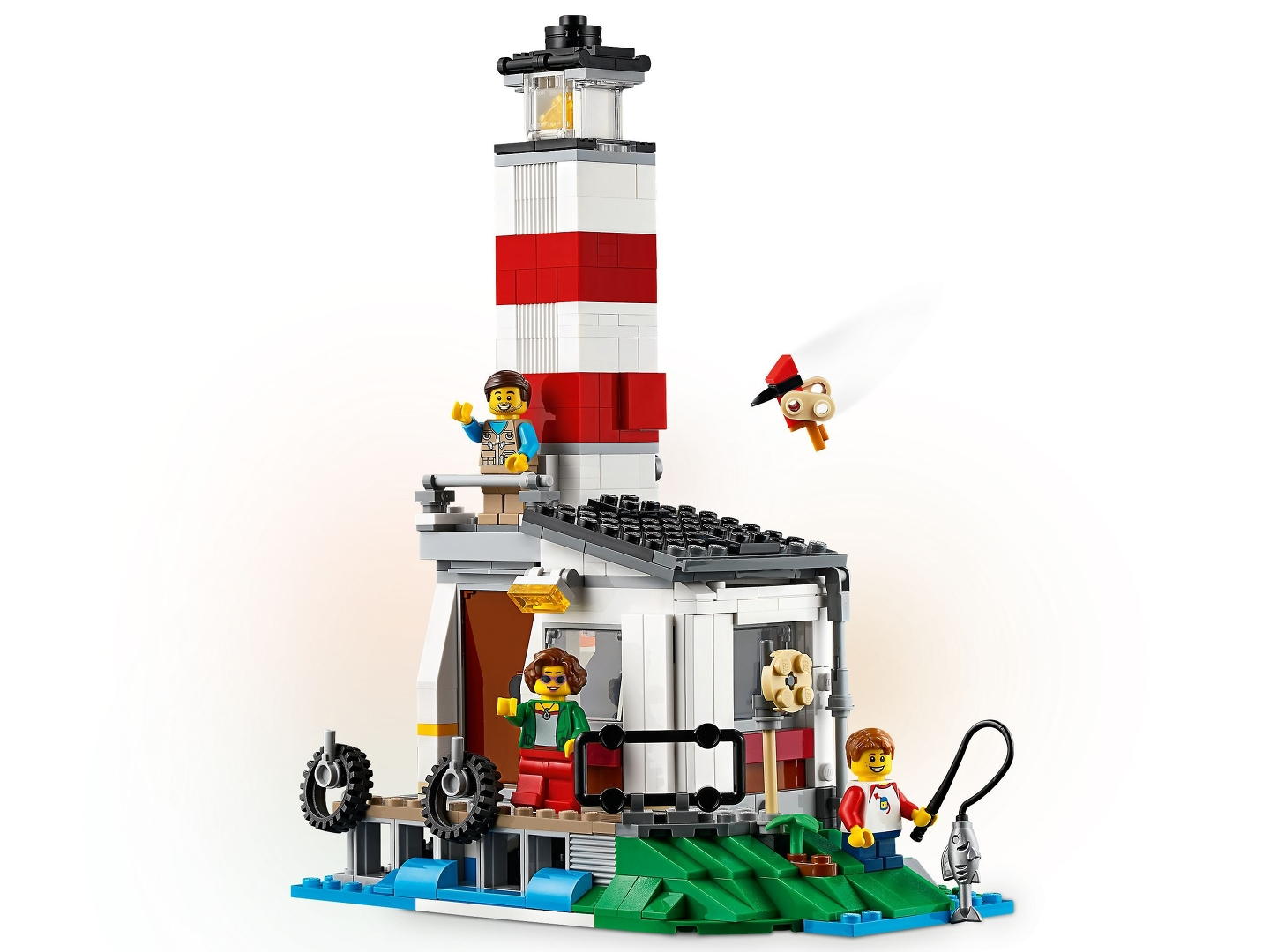 Lego Leuchtturm mit roten Streifen, zwei Figuren auf Plattform, einer angelt, Vogel fliegt.