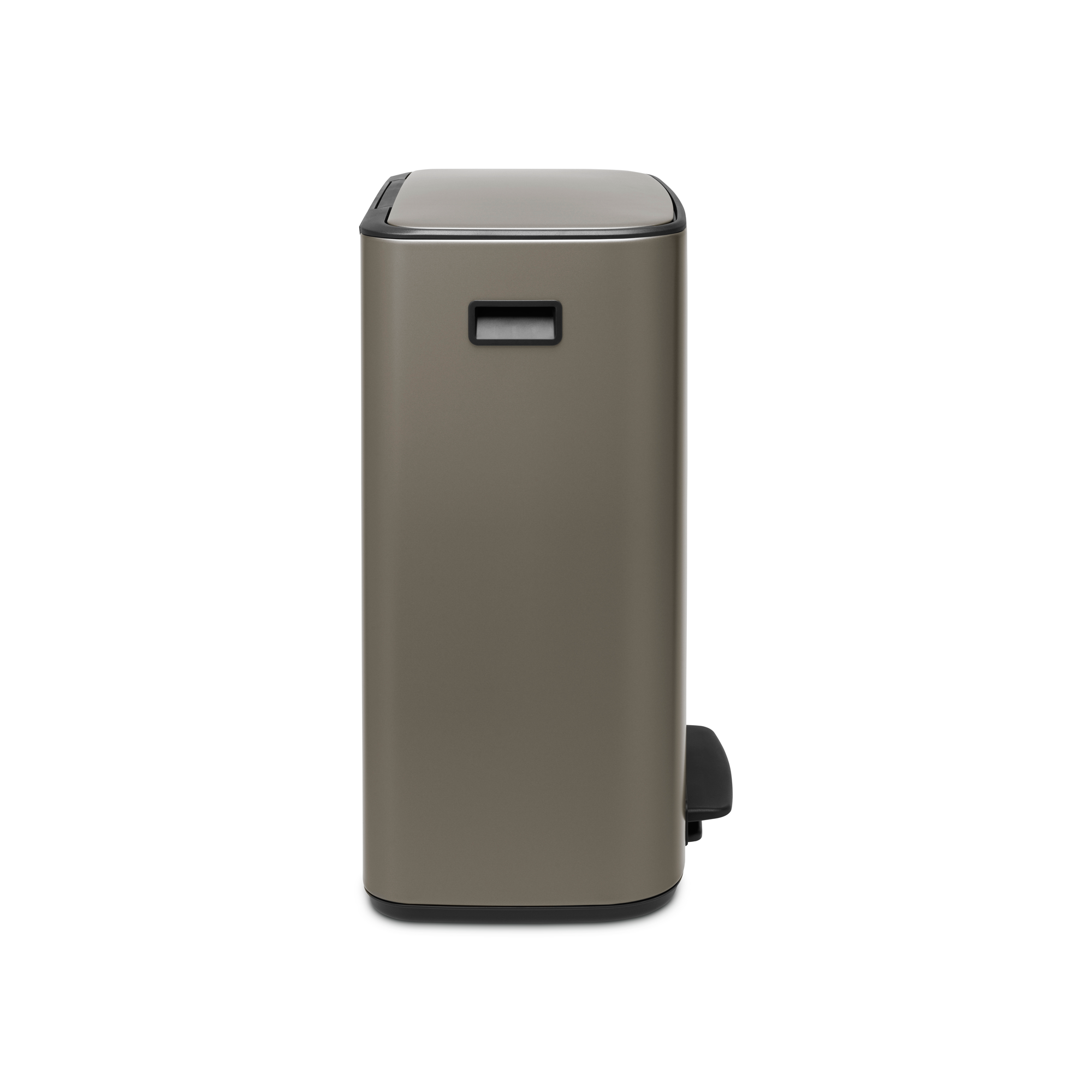 A rectangular, matte, taupe trash can with a black foot pedal and a handle.