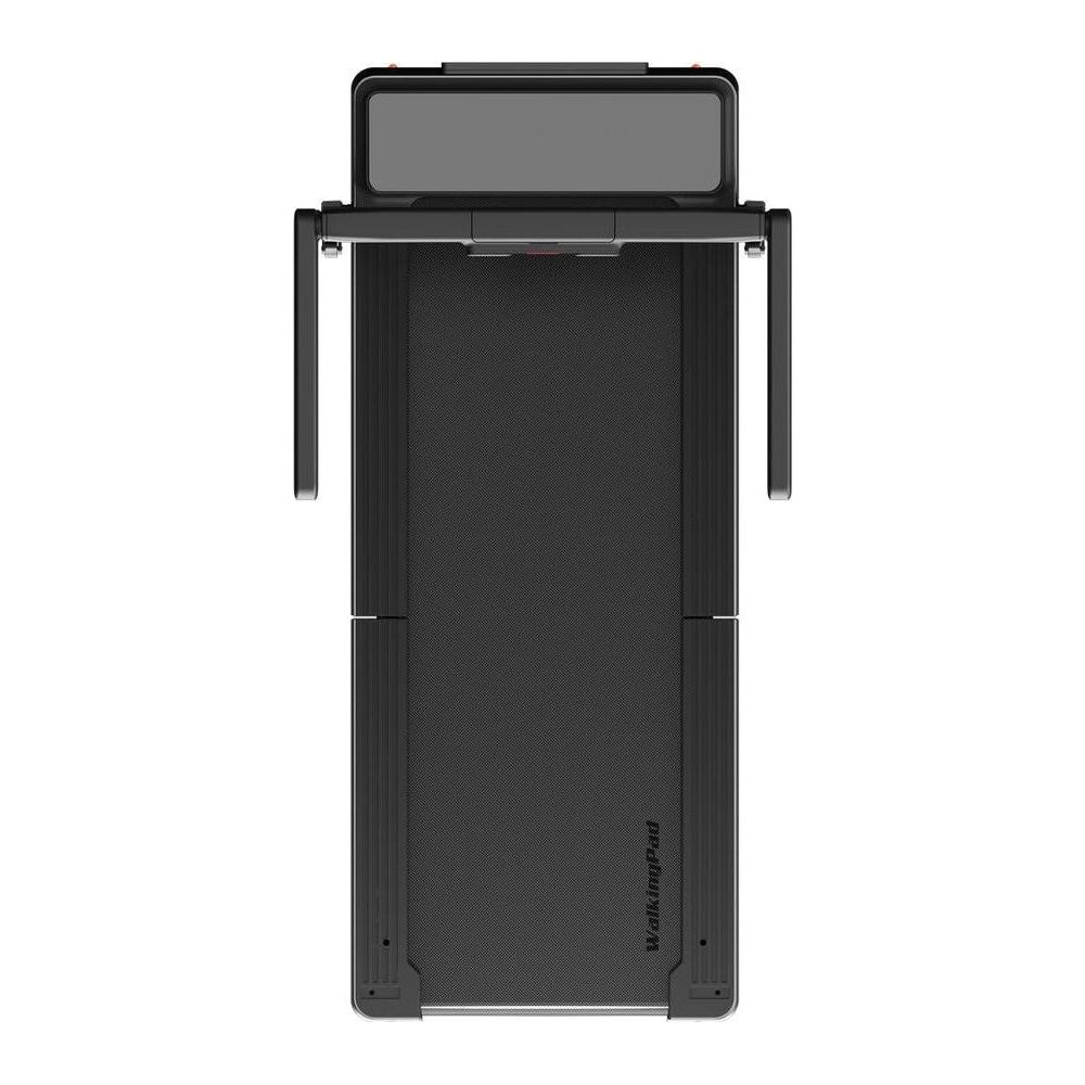 Czarna bieżnia ze składaną rączką i wyświetlaczem.