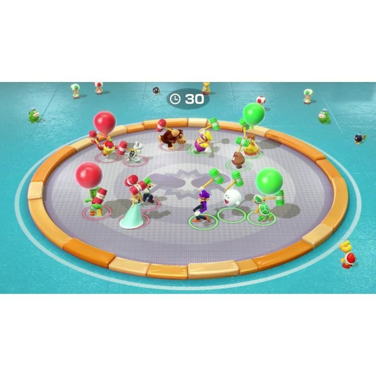 Postacie z Mario Party na arenie z młotkami i czerwonymi/zielonymi kulami.