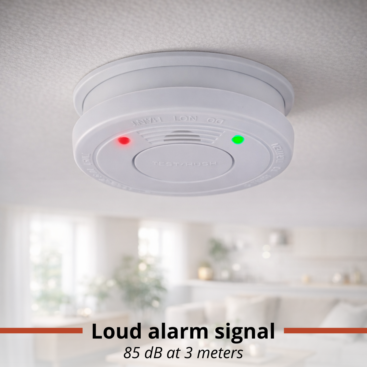 Smoke detector on ceiling with red and green LEDs. Living room in background.