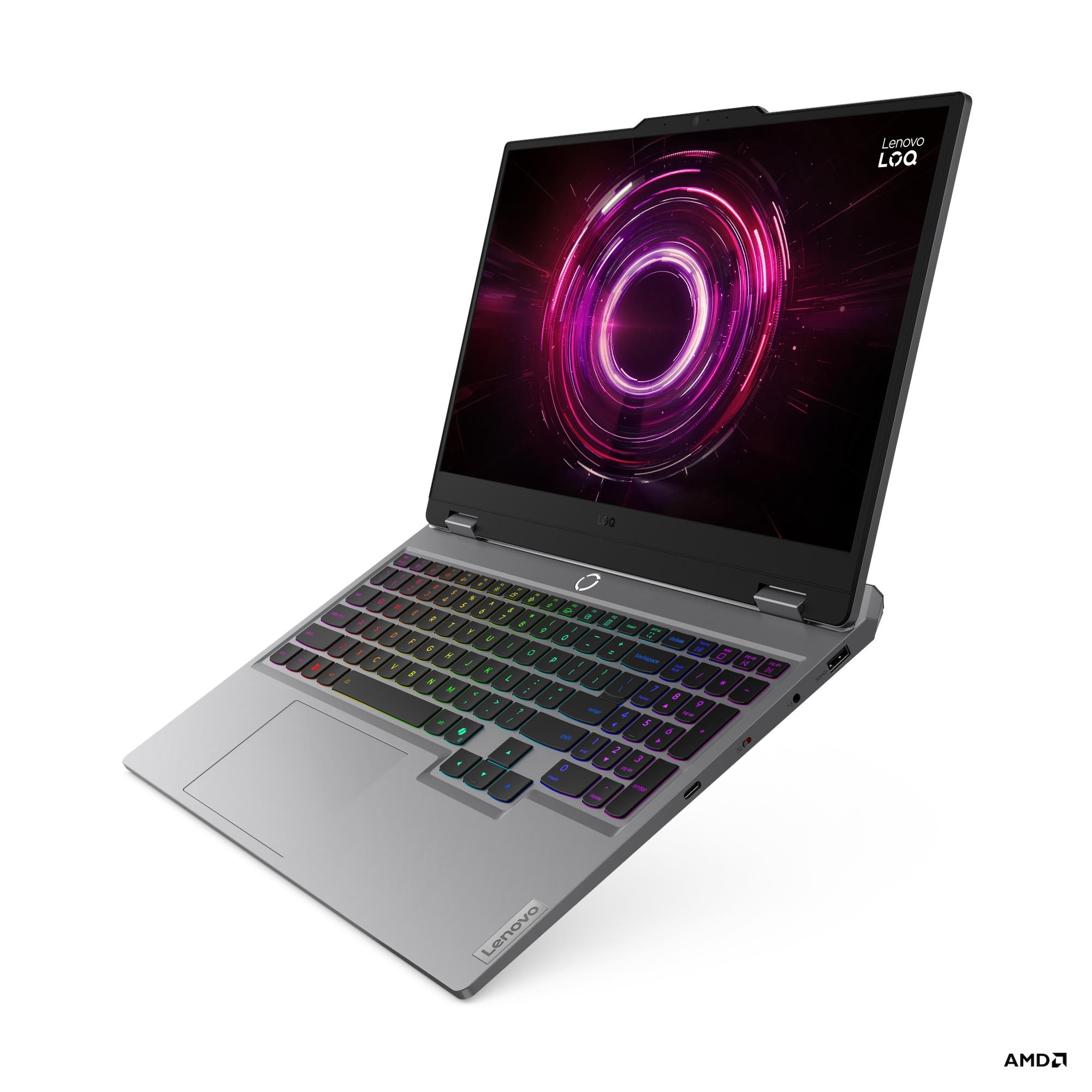 Ekranında dairesel mor desenli, aydınlatmalı klavyeye sahip gri Lenovo LOQ oyuncu dizüstü bilgisayarı.