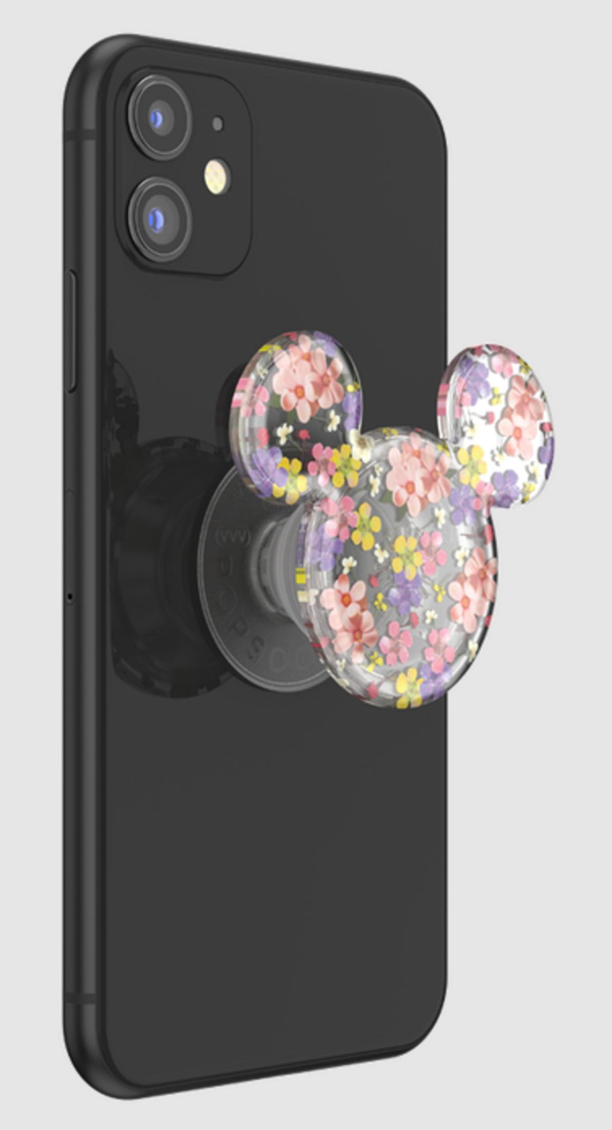 iPhone nero con pop socket trasparente di Topolino con fiori pressati colorati.