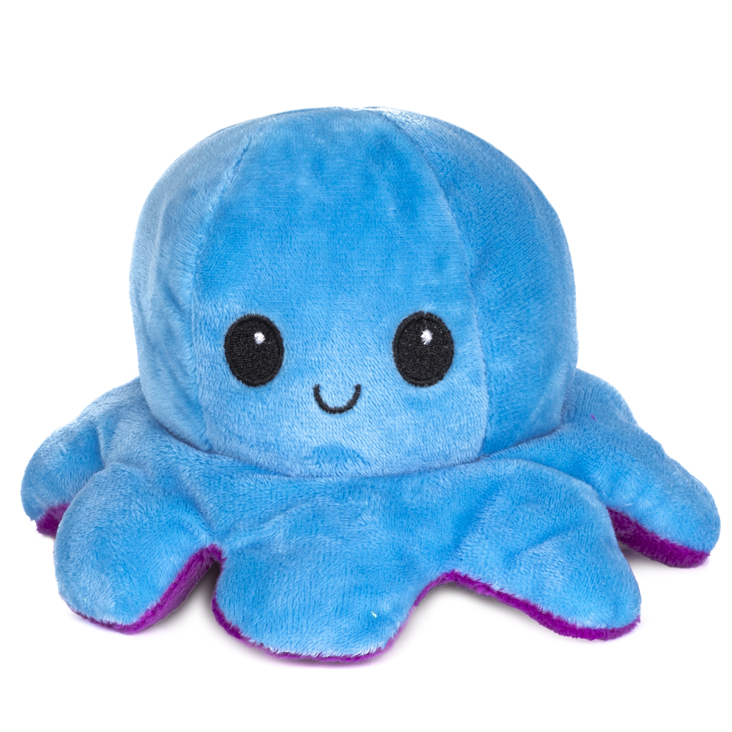 Un juguete de pulpo de peluche azul con detalles morados, ojos negros y boca sonriente.