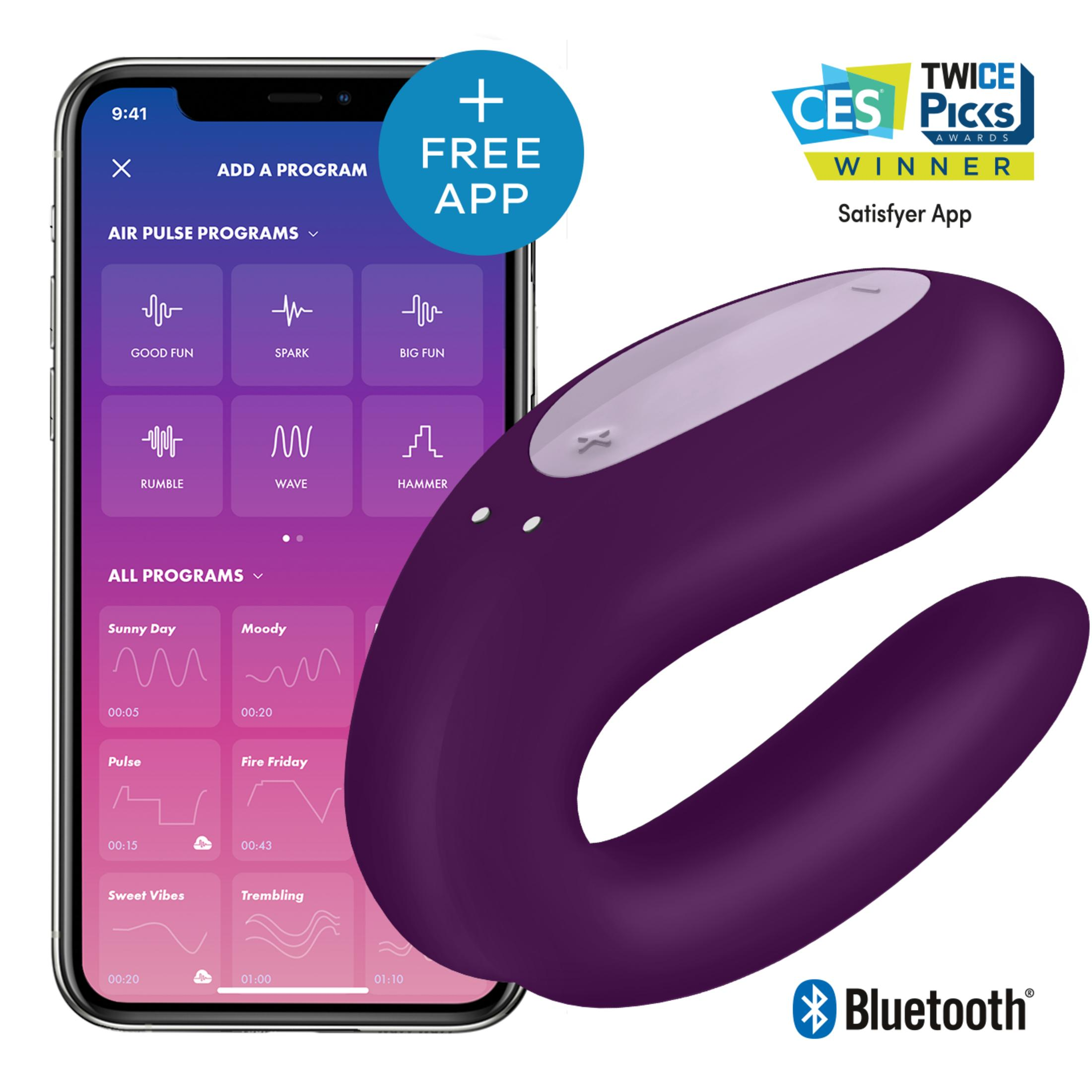 Fioletowe urządzenie Satisfyer obok smartfona wyświetlającego aplikację.