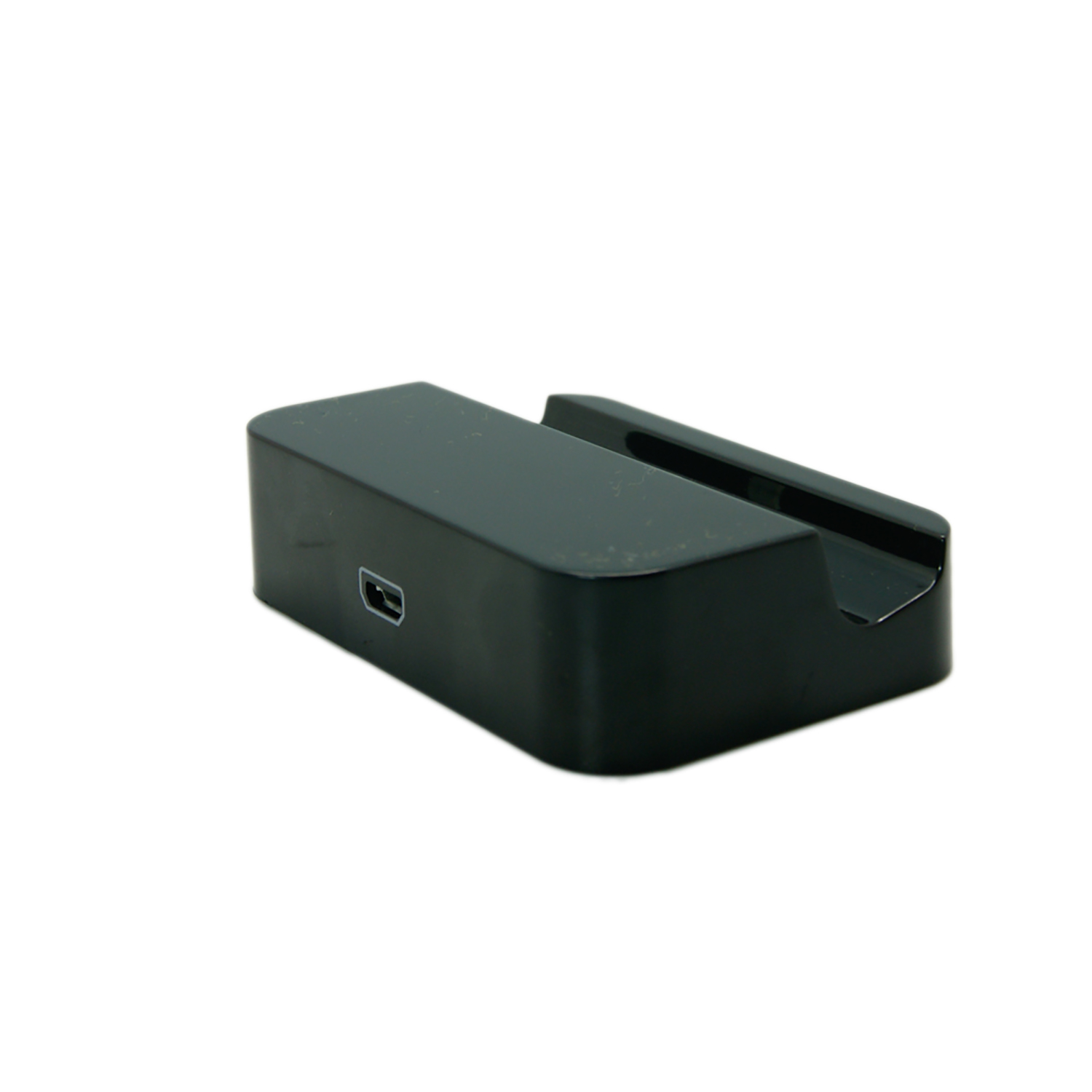 Base de carga negra con puerto USB sobre fondo blanco.