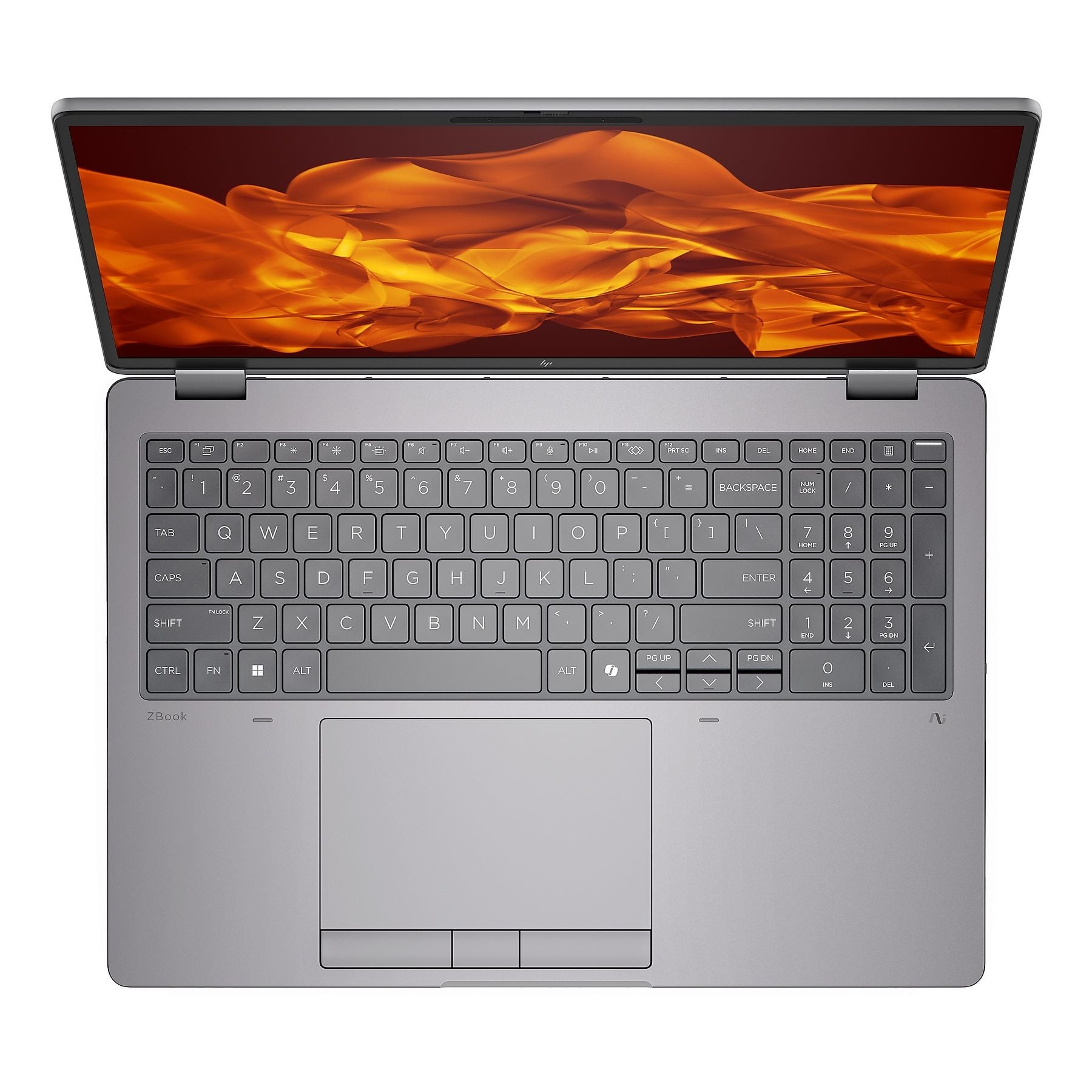 Un laptop grigio aperto con uno sfondo arancione astratto sullo schermo.