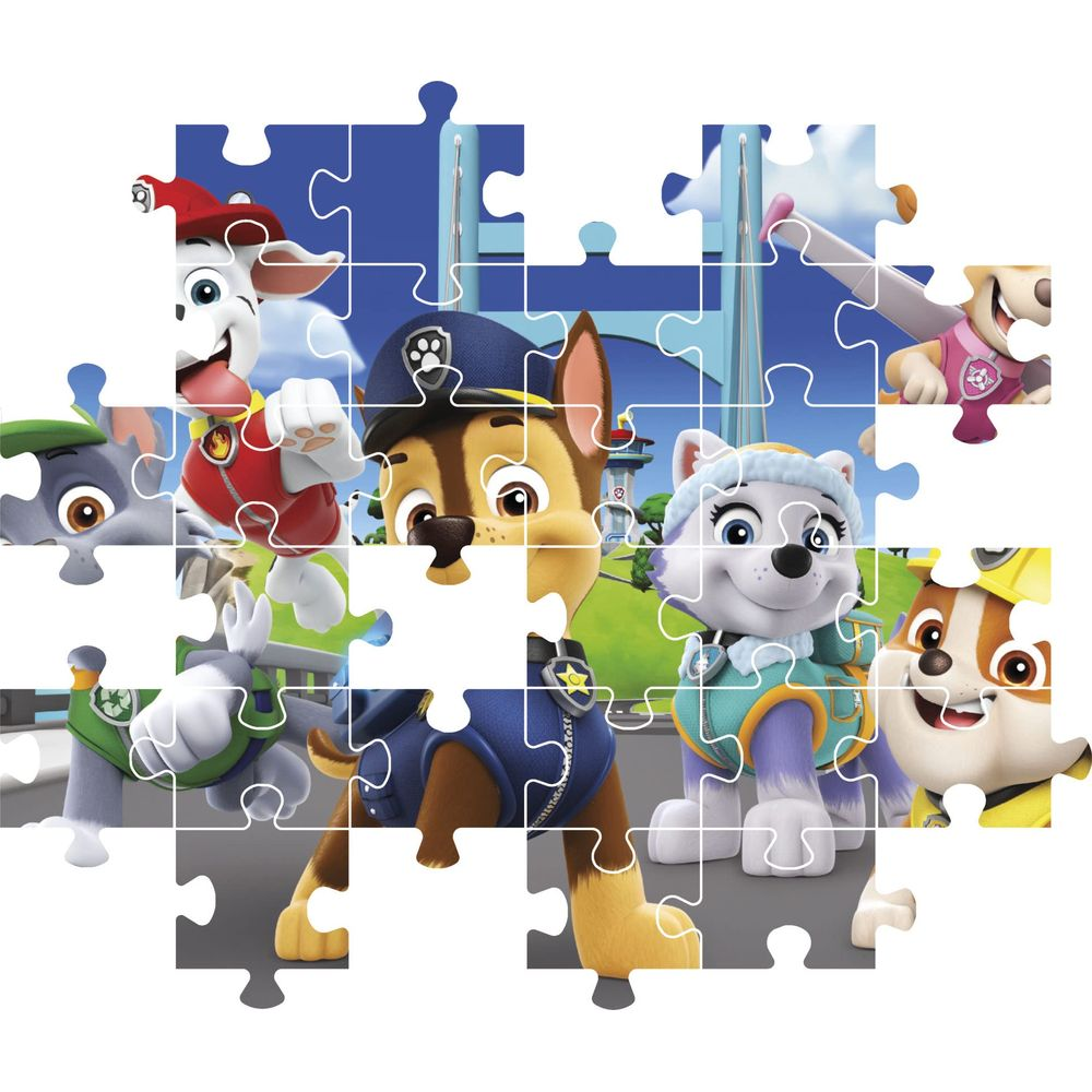 Cani di Paw Patrol su un puzzle davanti a un ponte.