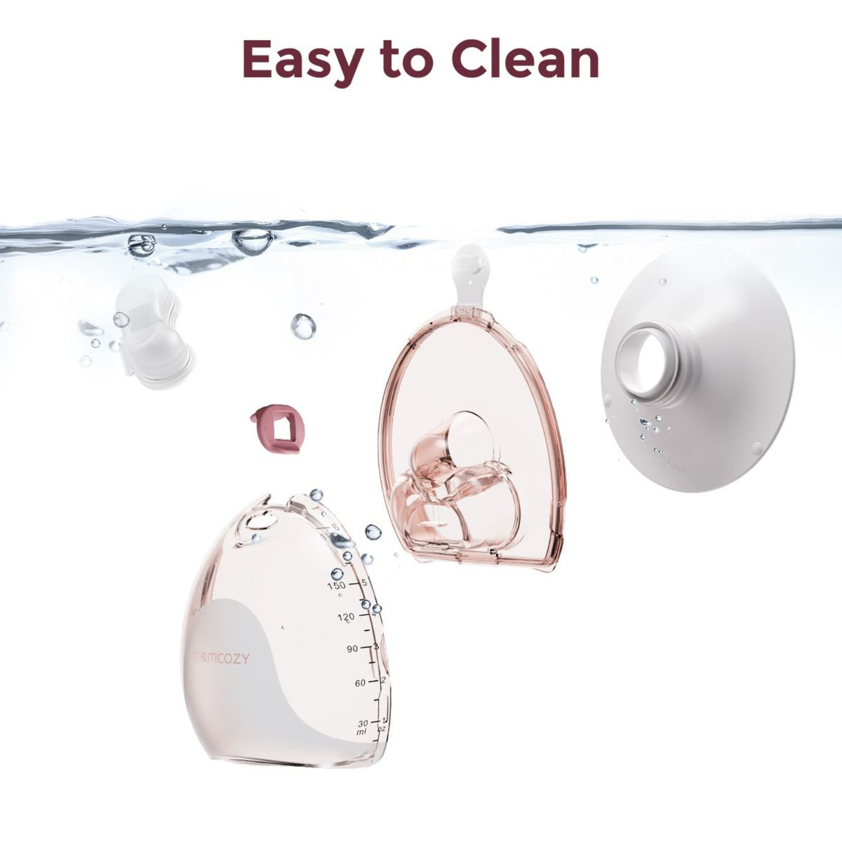 Babyflaschenteile sind in Wasser mit Blasen eingetaucht.
