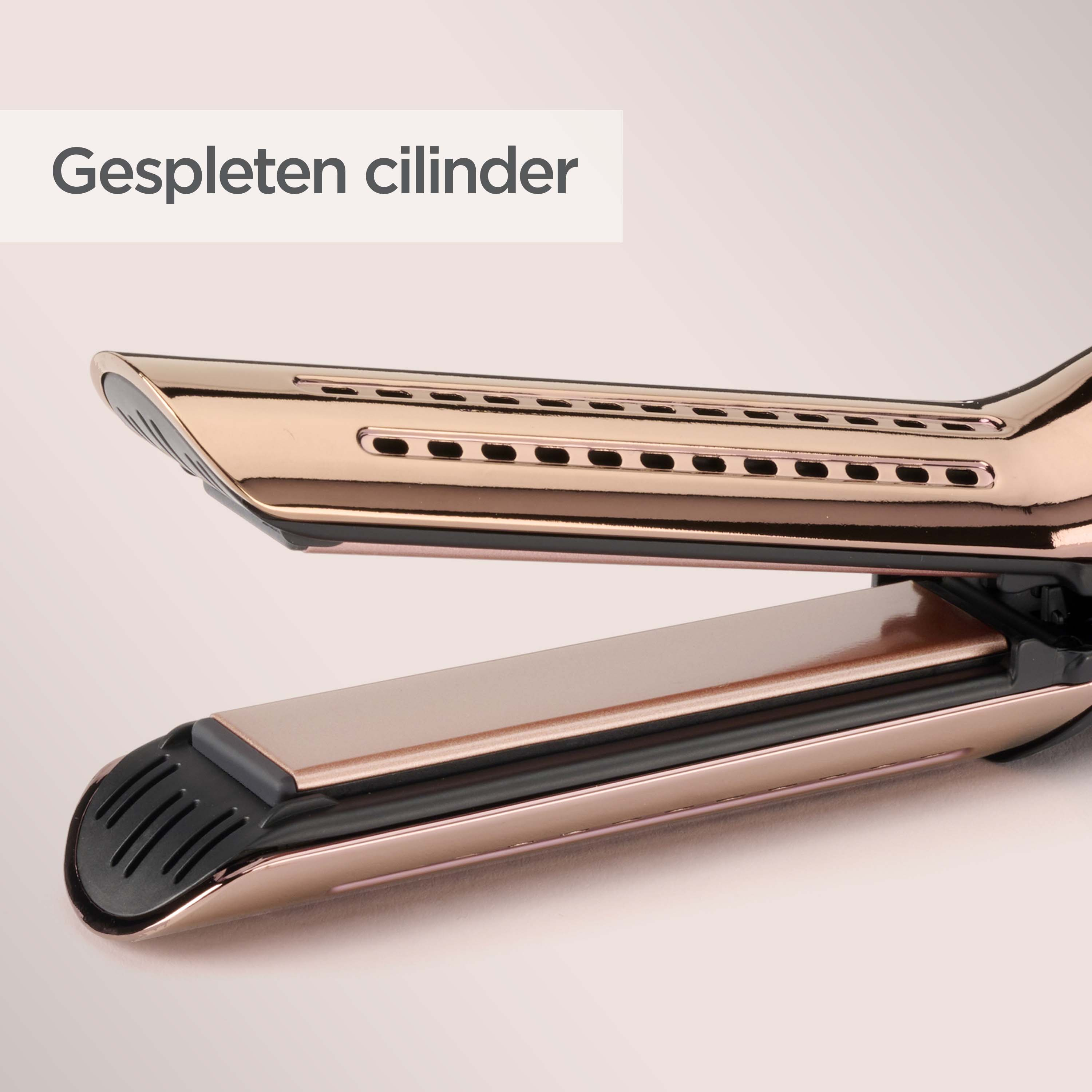Una plancha de pelo oro rosa con ranuras de ventilacin.