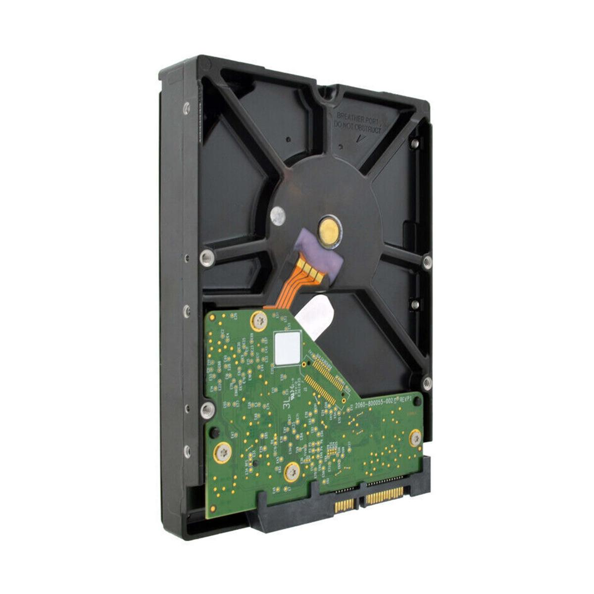 Gros plan d'un disque dur noir, montrant circuit imprimé et connecteurs.