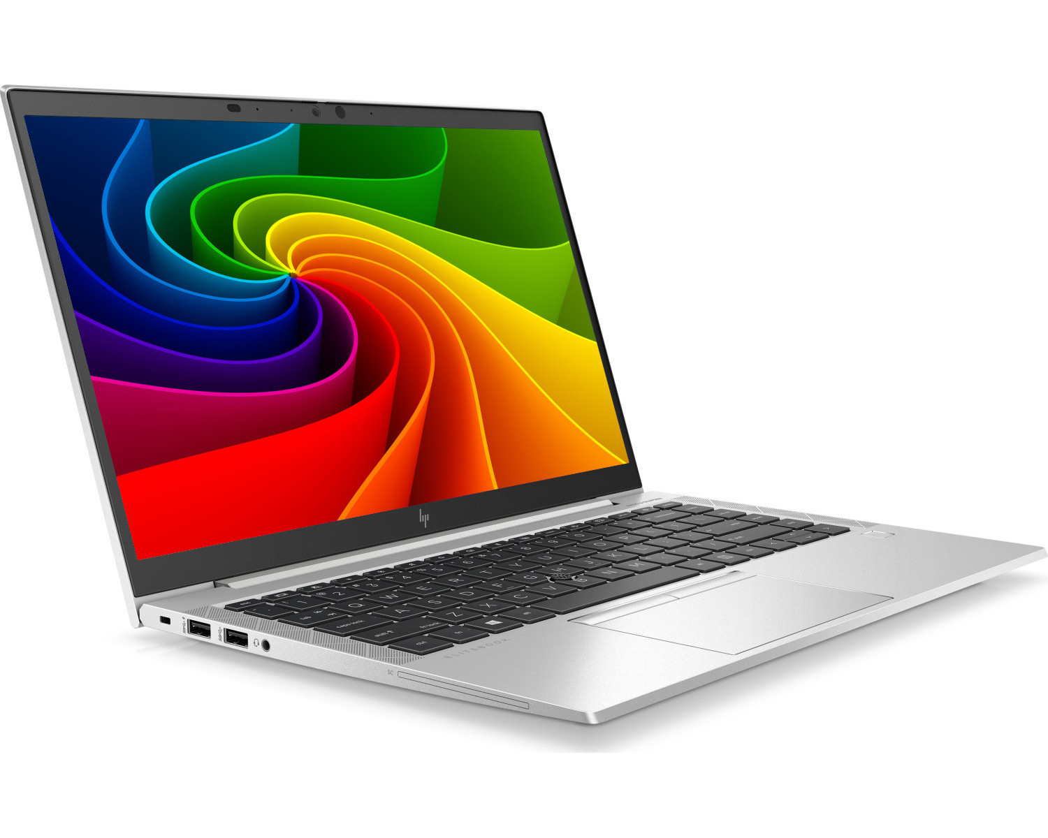 Ein silberner Laptop mit einem Regenbogen-Abstraktionshintergrund auf dem Bildschirm.