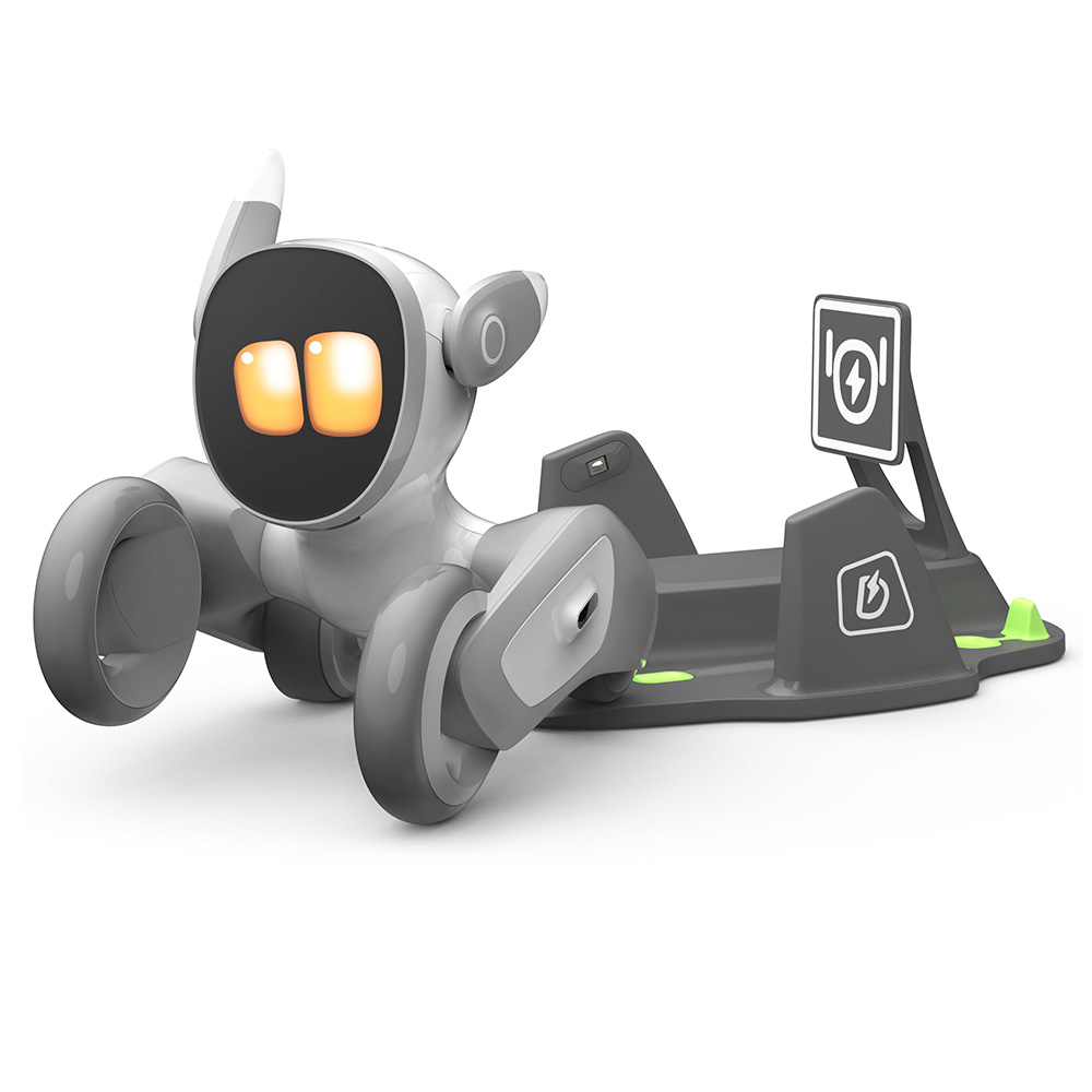 Ein grauer Roboter mit leuchtenden Augen liegt auf einer Ladestation.