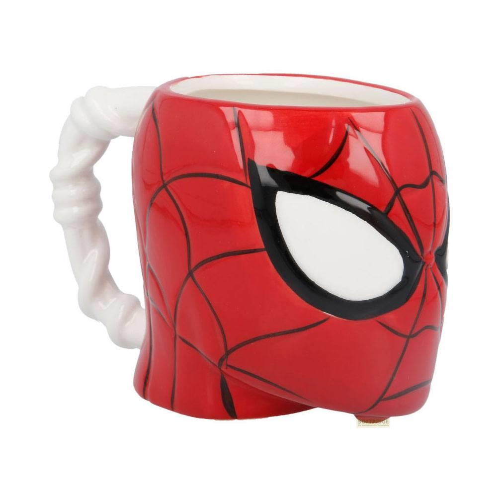 Una taza roja con diseño de cara de Spiderman y asa blanca de telaraña.