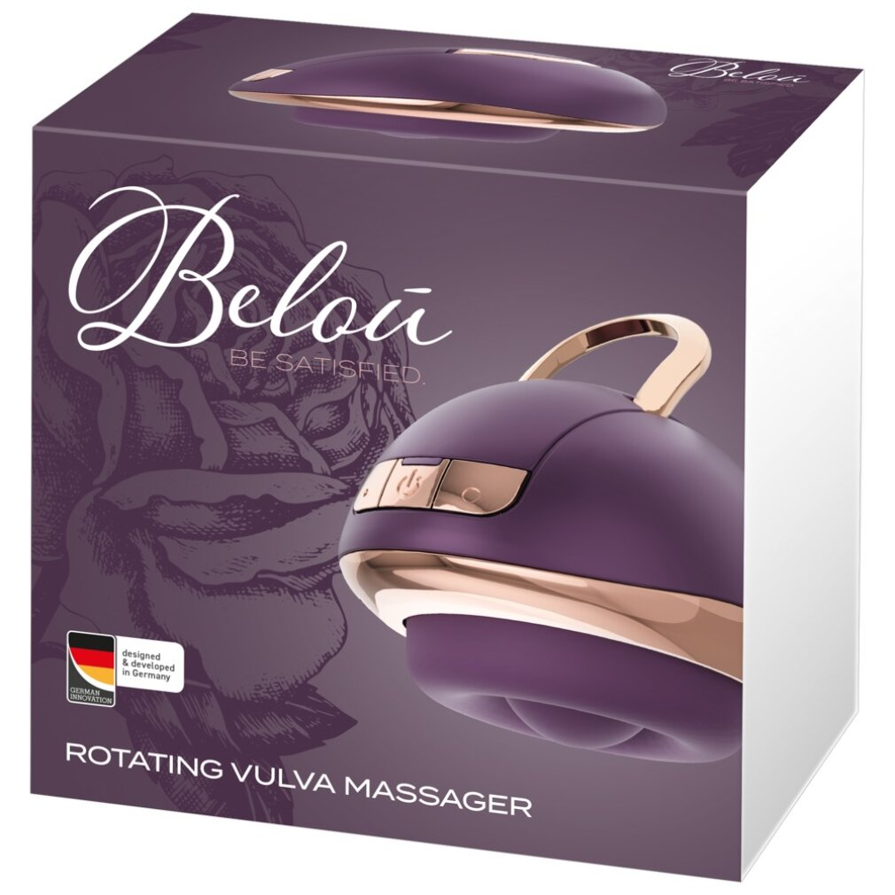 Lila Vulva-Massagegerät mit goldenen Akzenten auf einer Box mit Rosenmuster.
