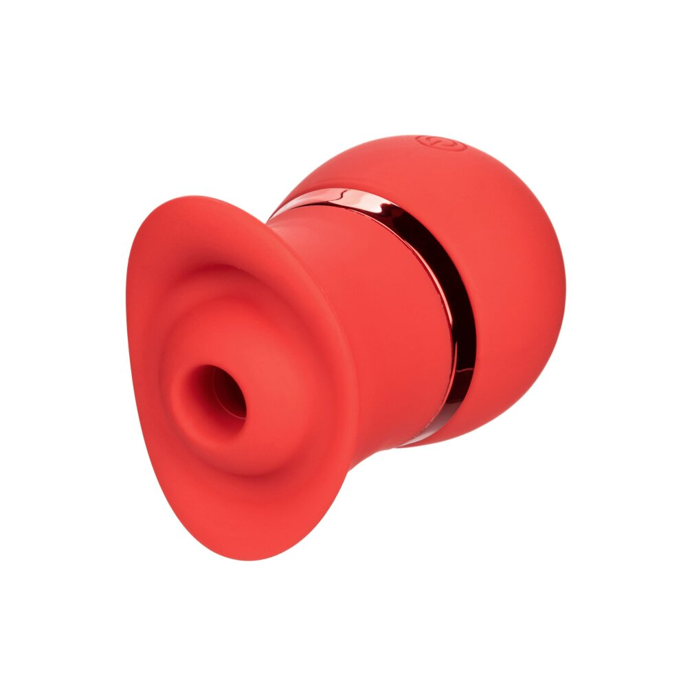 Eine rote Saugnapf-Vibrationshilfe mit einem glänzenden Ring.
