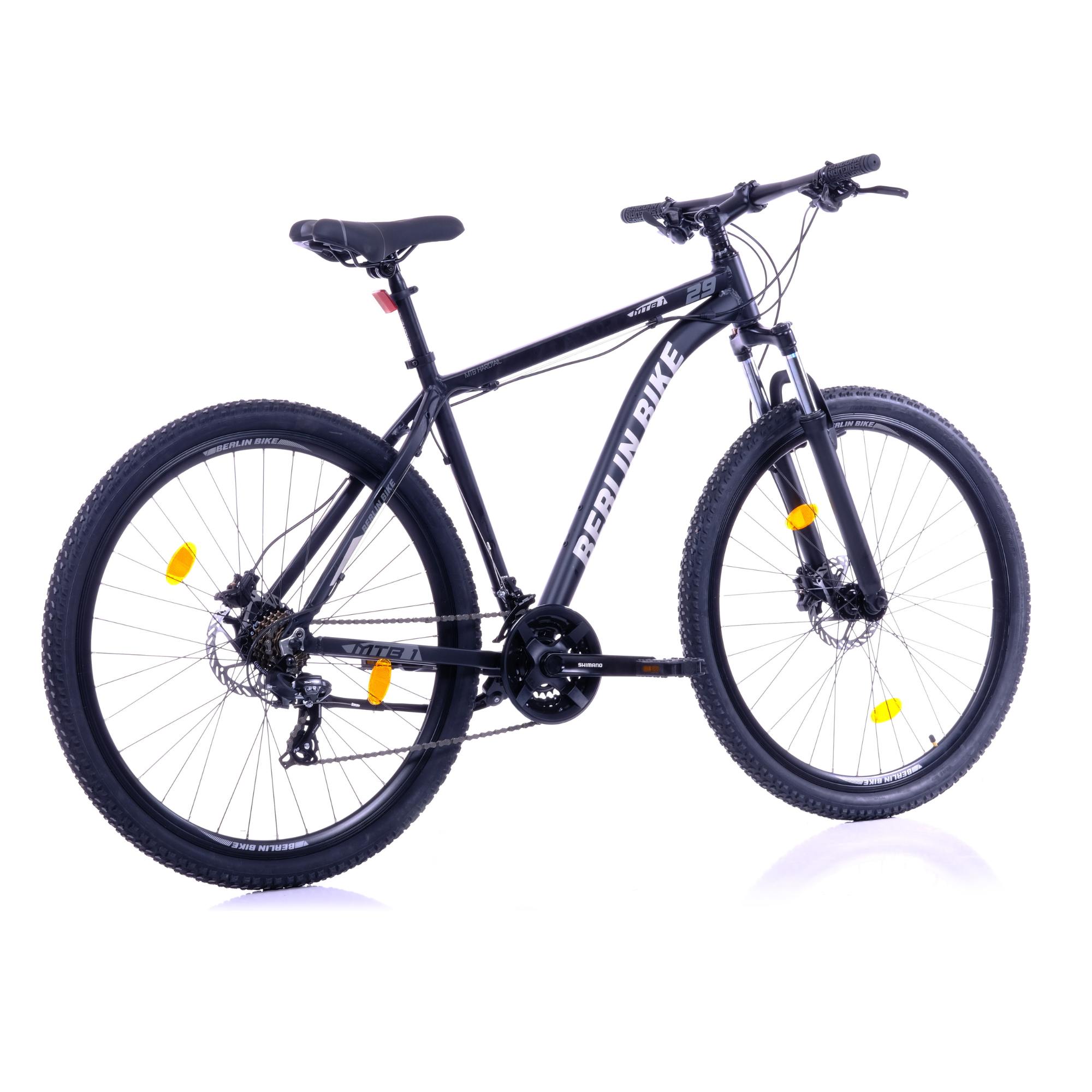 Ein schwarzes Mountainbike mit 29-Zoll-Rädern, Scheibenbremsen und gelben Reflektoren.