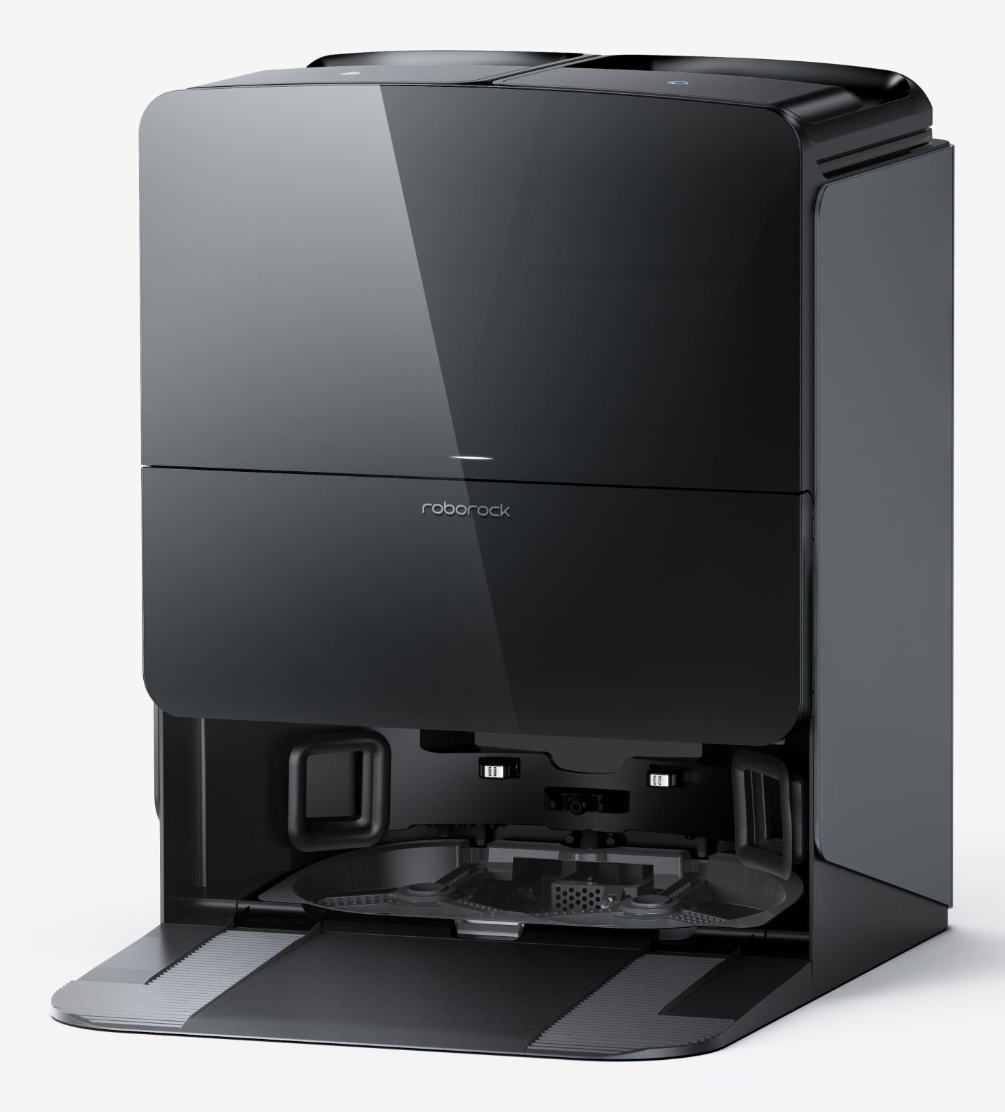 Czarny robot sprzątający ze stacją dokującą i otwartą komorą.