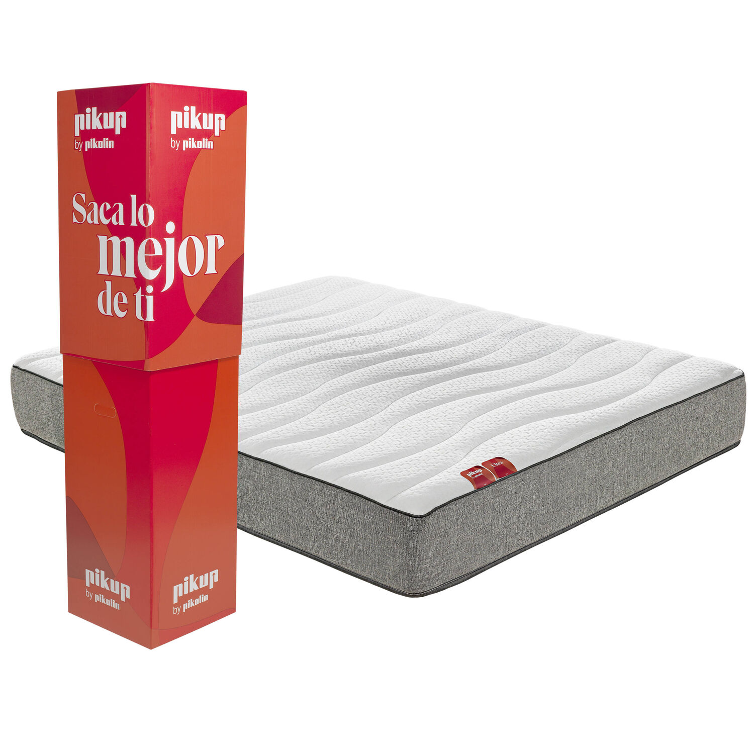 Una caja de colchón junto a un colchón blanco con borde gris.