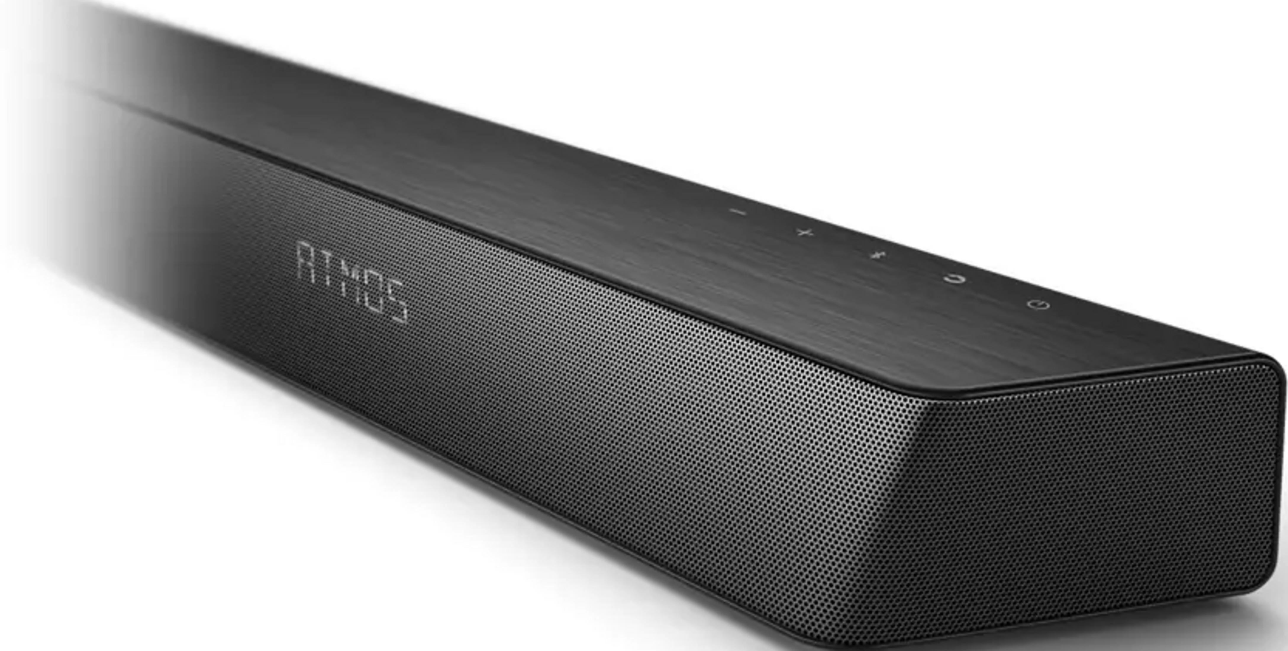 Czarny soundbar z siatkowym frontem i wyświetlaczem "ATMOS".