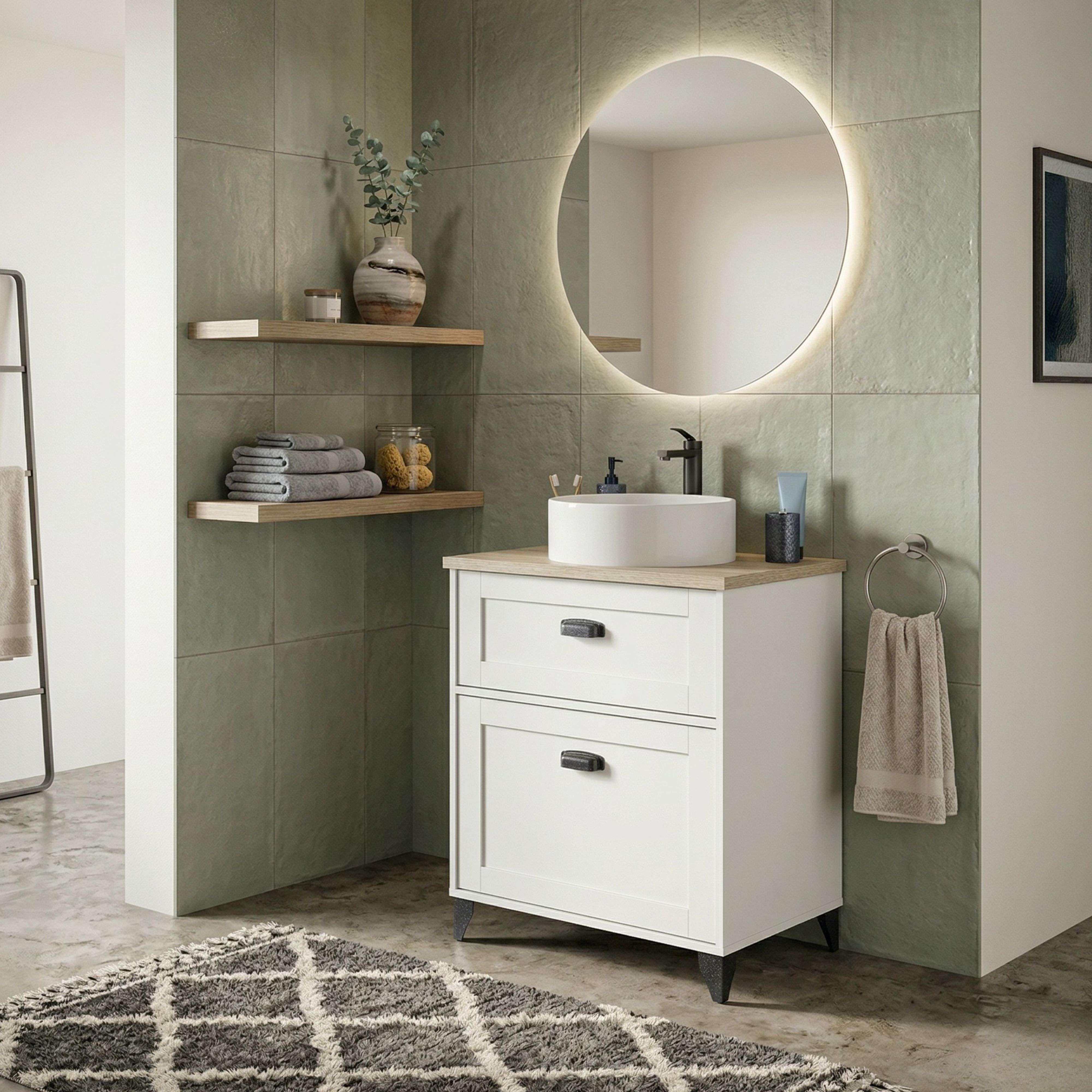 Baño moderno con mueble de lavabo blanco, espejo, estantes y pared de azulejos grises.