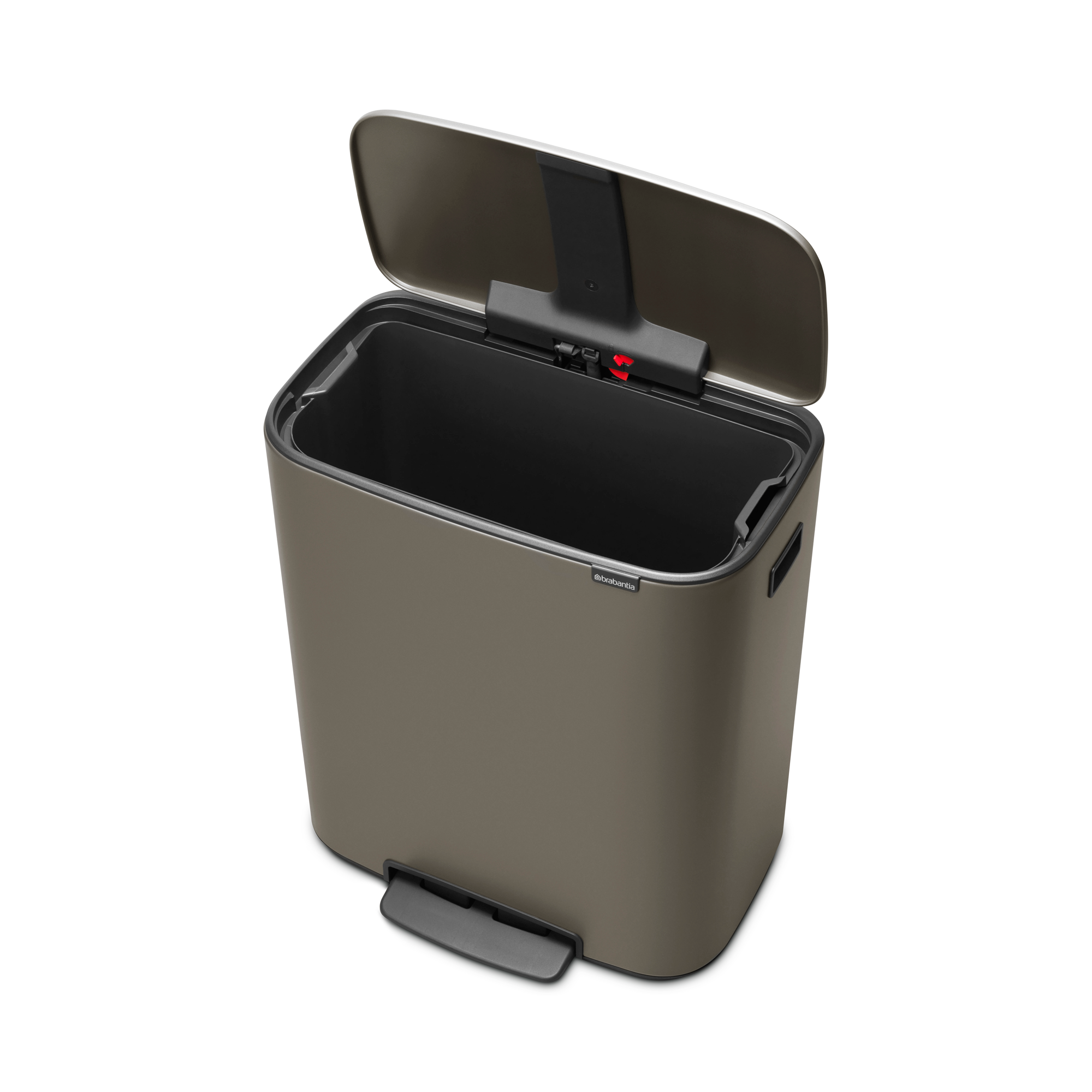A brown step bin with its lid open, showing a black interior.
