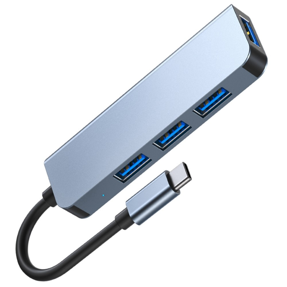 Ein silberner USB-C-Hub mit vier blauen USB 3.0-Anschlüssen und schwarzem Kabel.