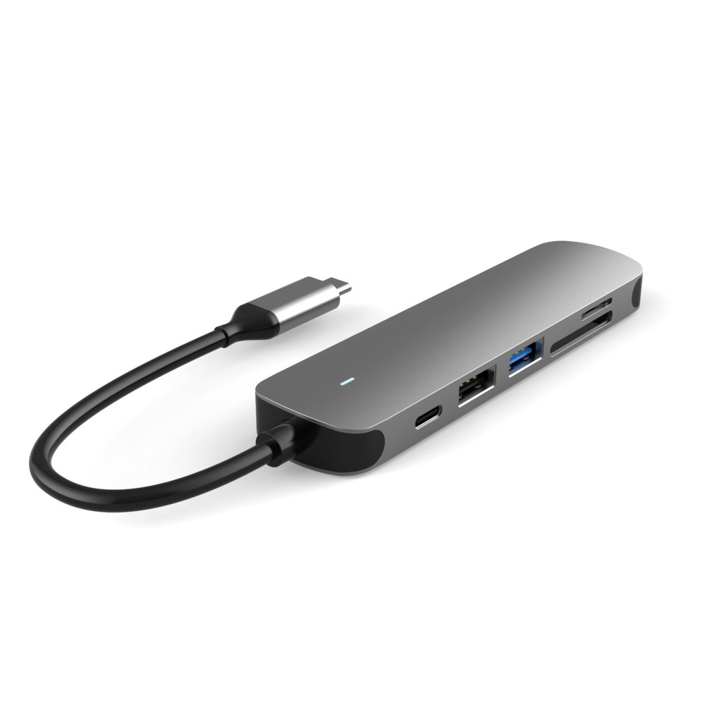 Hub USB-C grigio con cavo, slot per schede SD e porte USB.