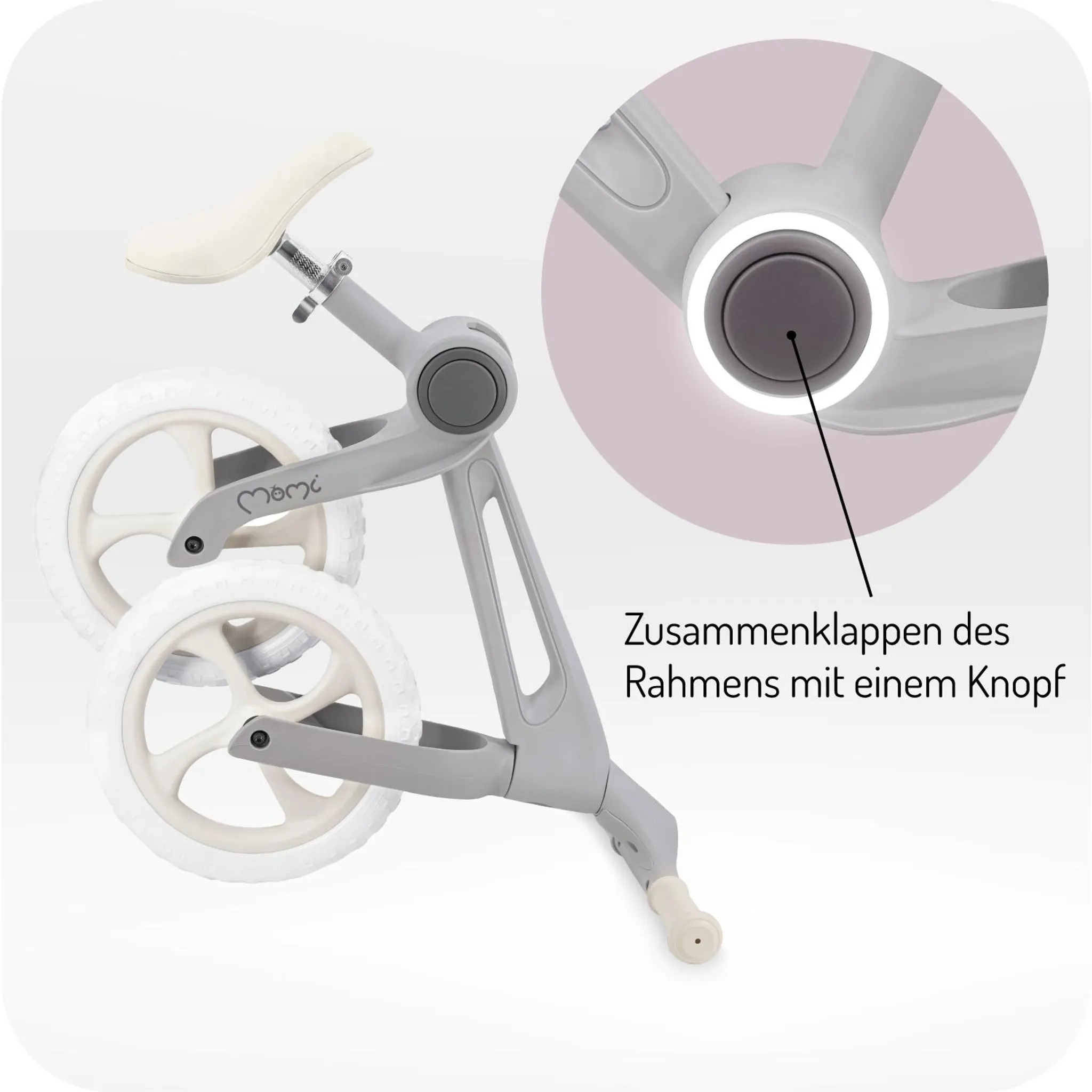 Graues Laufrad mit weißem Sattel und Rädern. Rahmen faltbar.